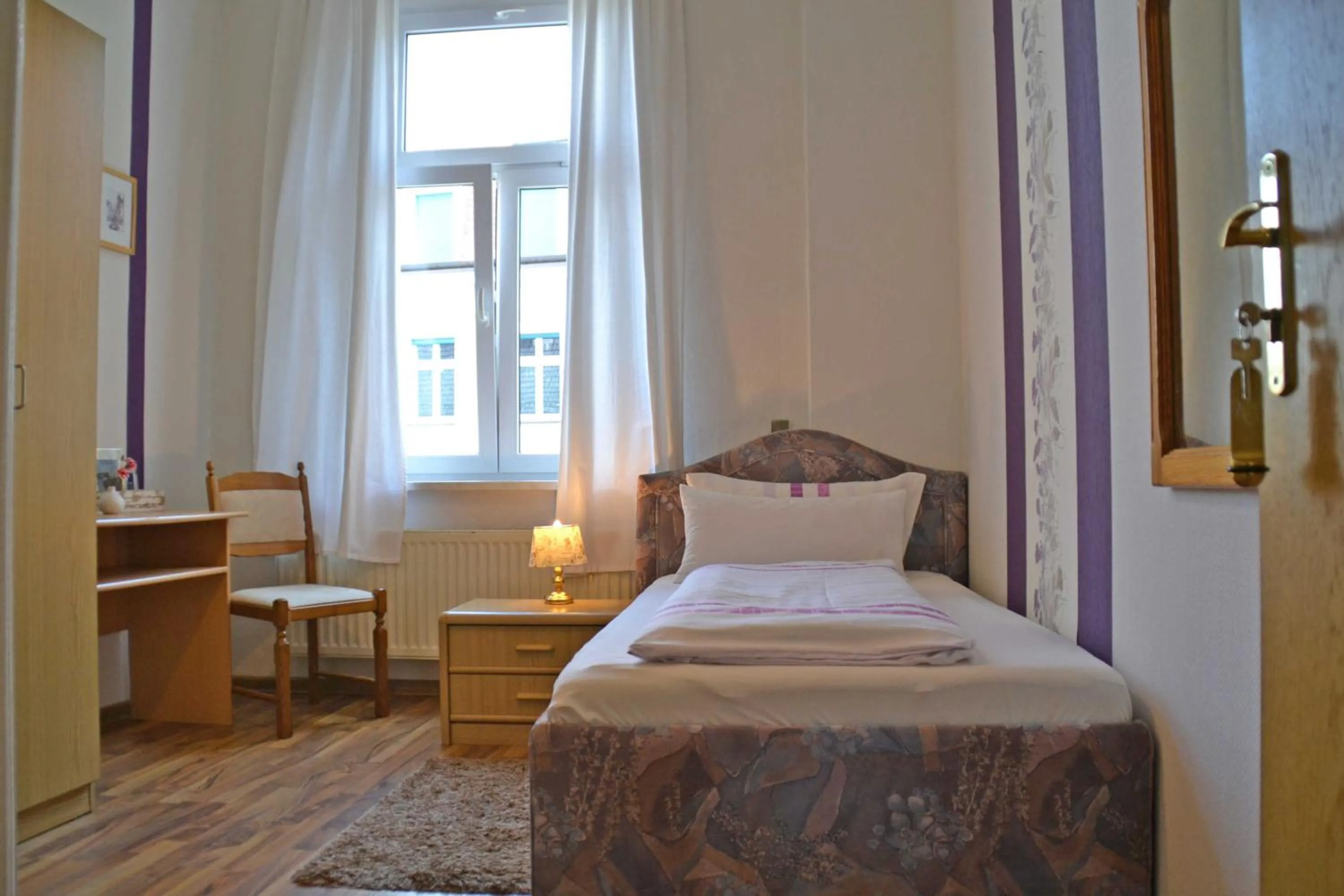 Bed in Pension zur Neiße