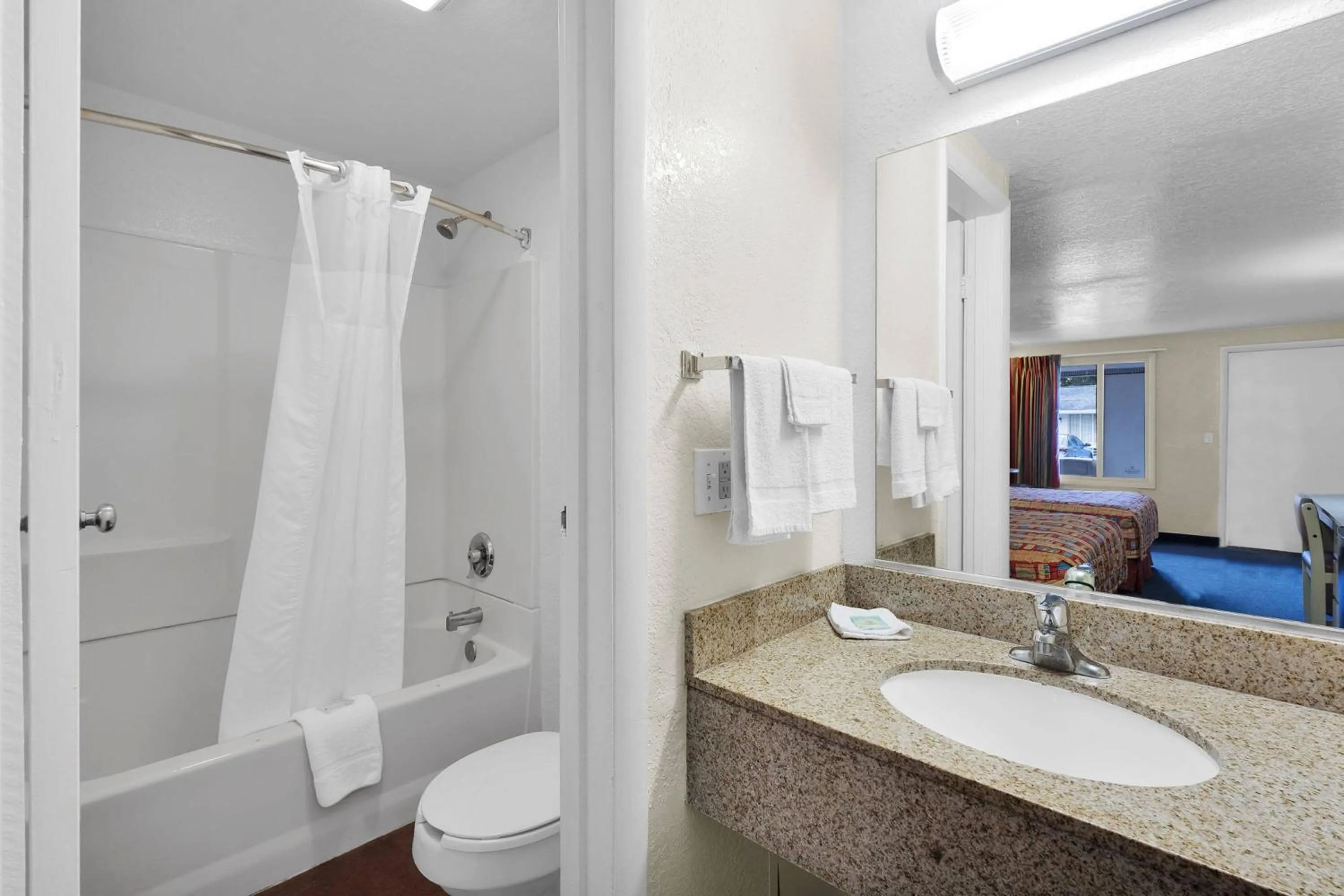 Toilet in Knights Inn Jacksonville at Dix Ellis Trail