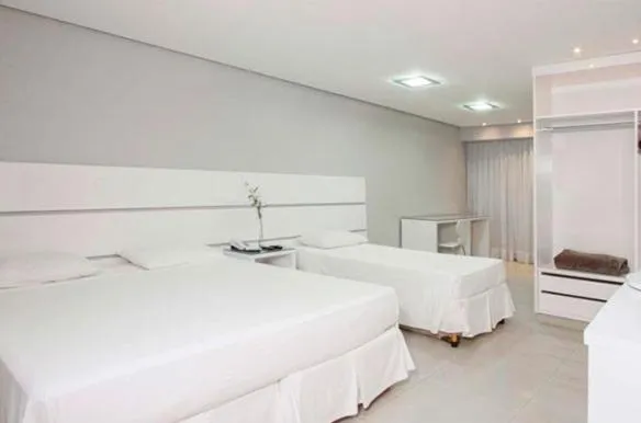 Bed in Brisa Tower Hotel