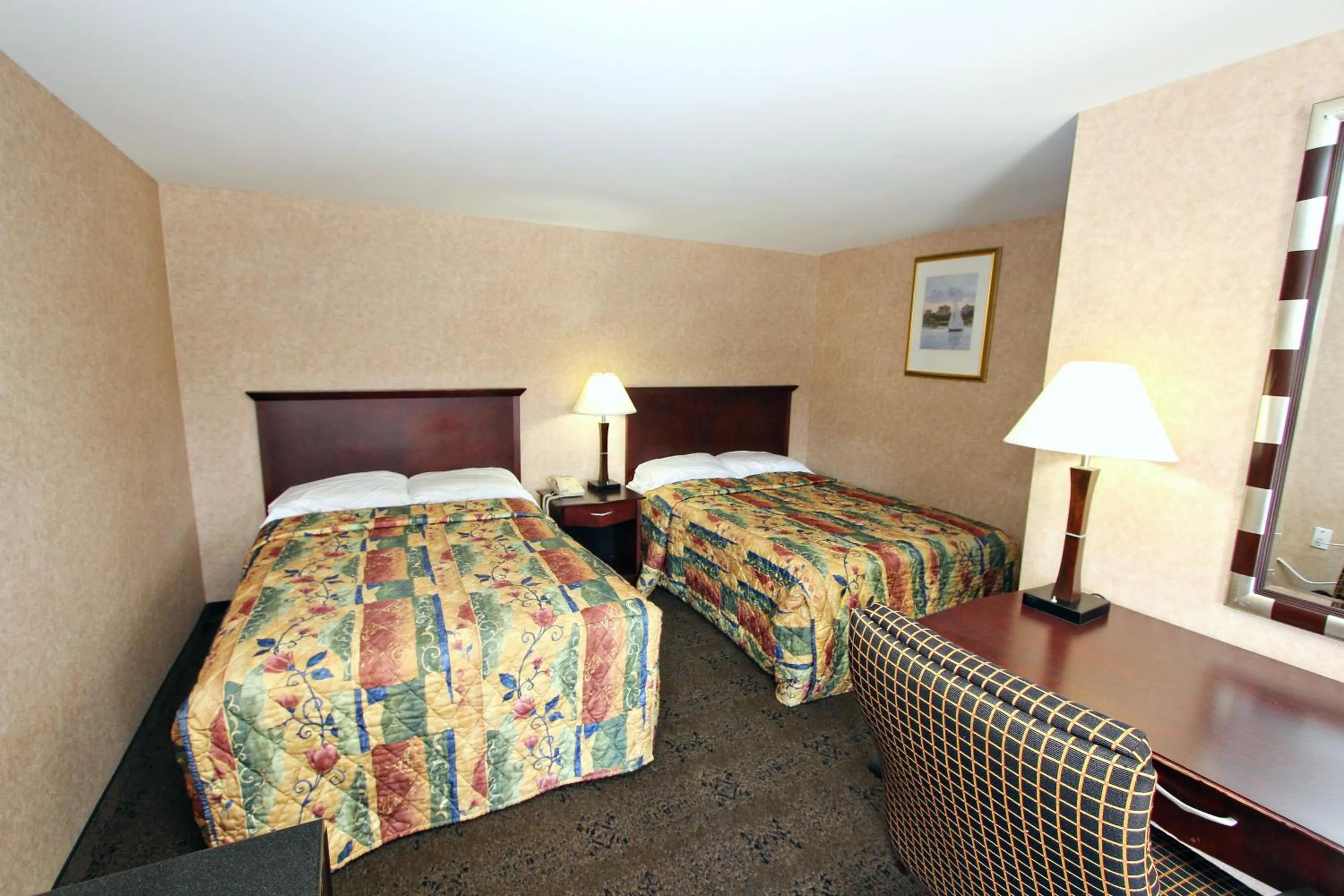 Bed in Knights Inn Pine Grove