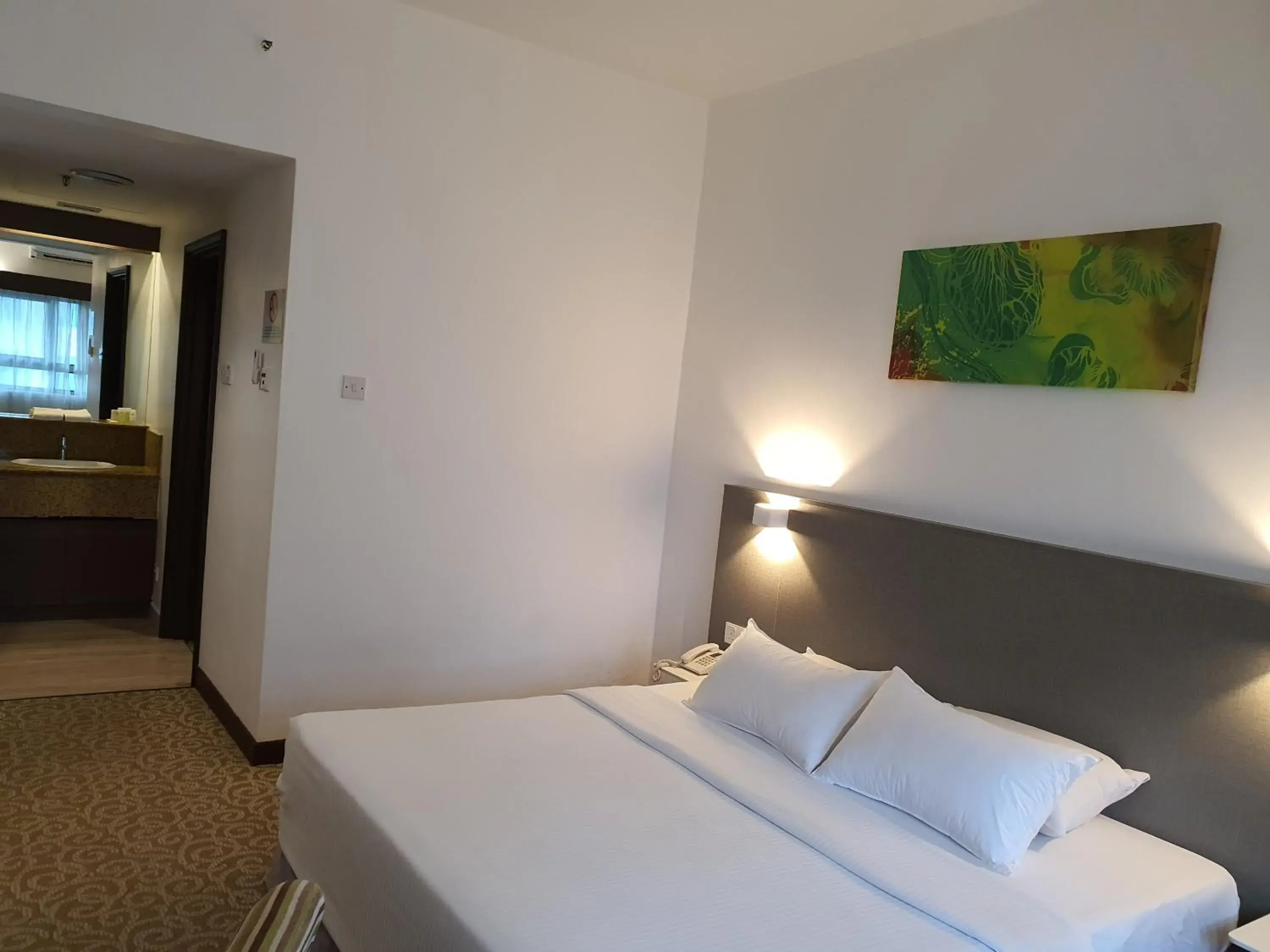 Bed in Crown Regency Serviced Suites Bed in Crown Regency Serviced Suites