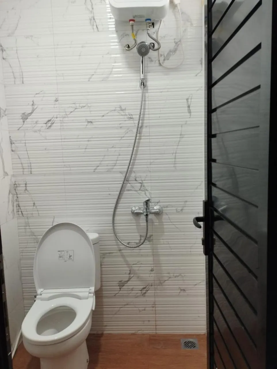 Bathroom in Musafir Guest House Syariah