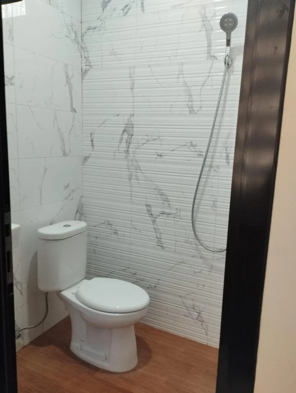 Bathroom in Musafir Guest House Syariah