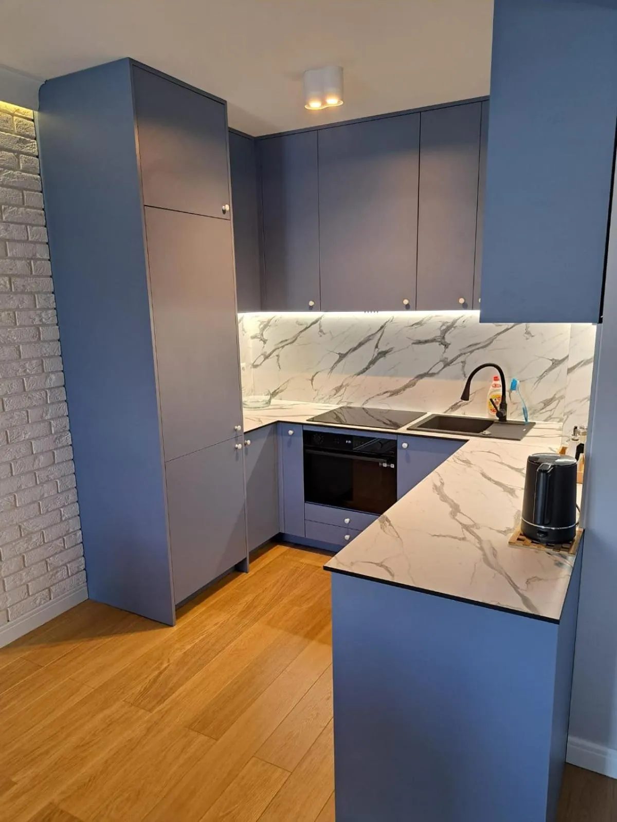 Kitchen or kitchenette in Pokoje De Luxe Figaro