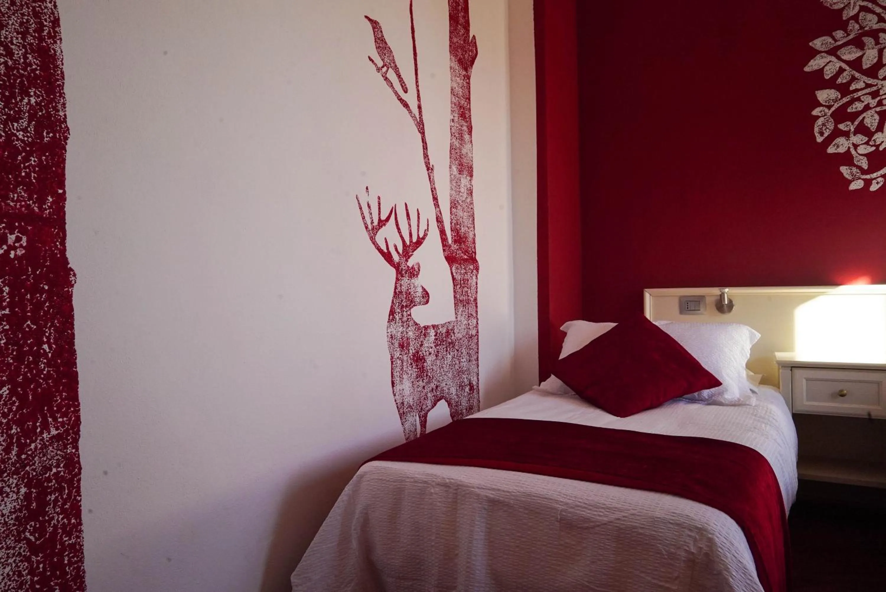 Decorative detail, Bed in Hotel Il Crinale