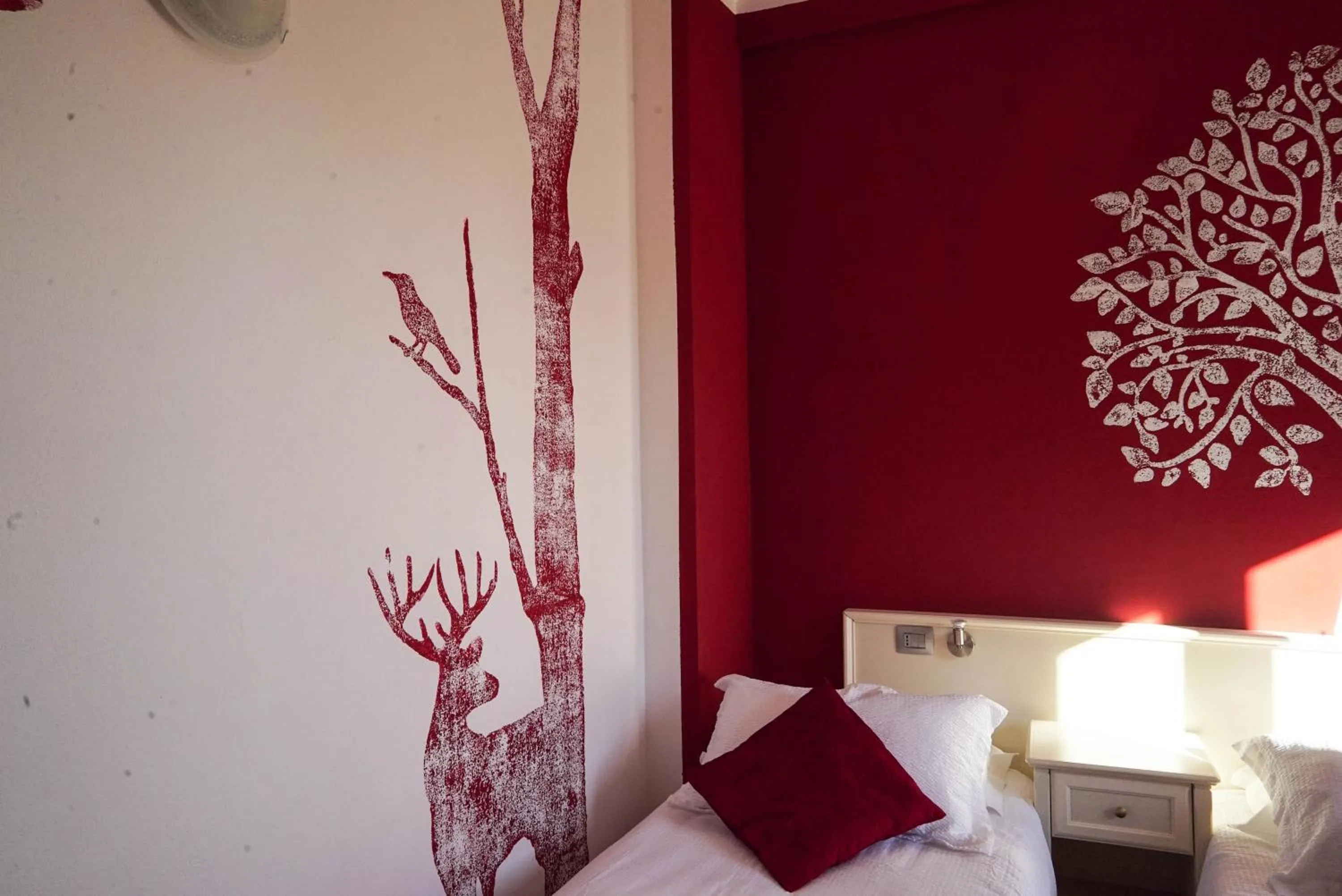 Decorative detail, Bed in Hotel Il Crinale