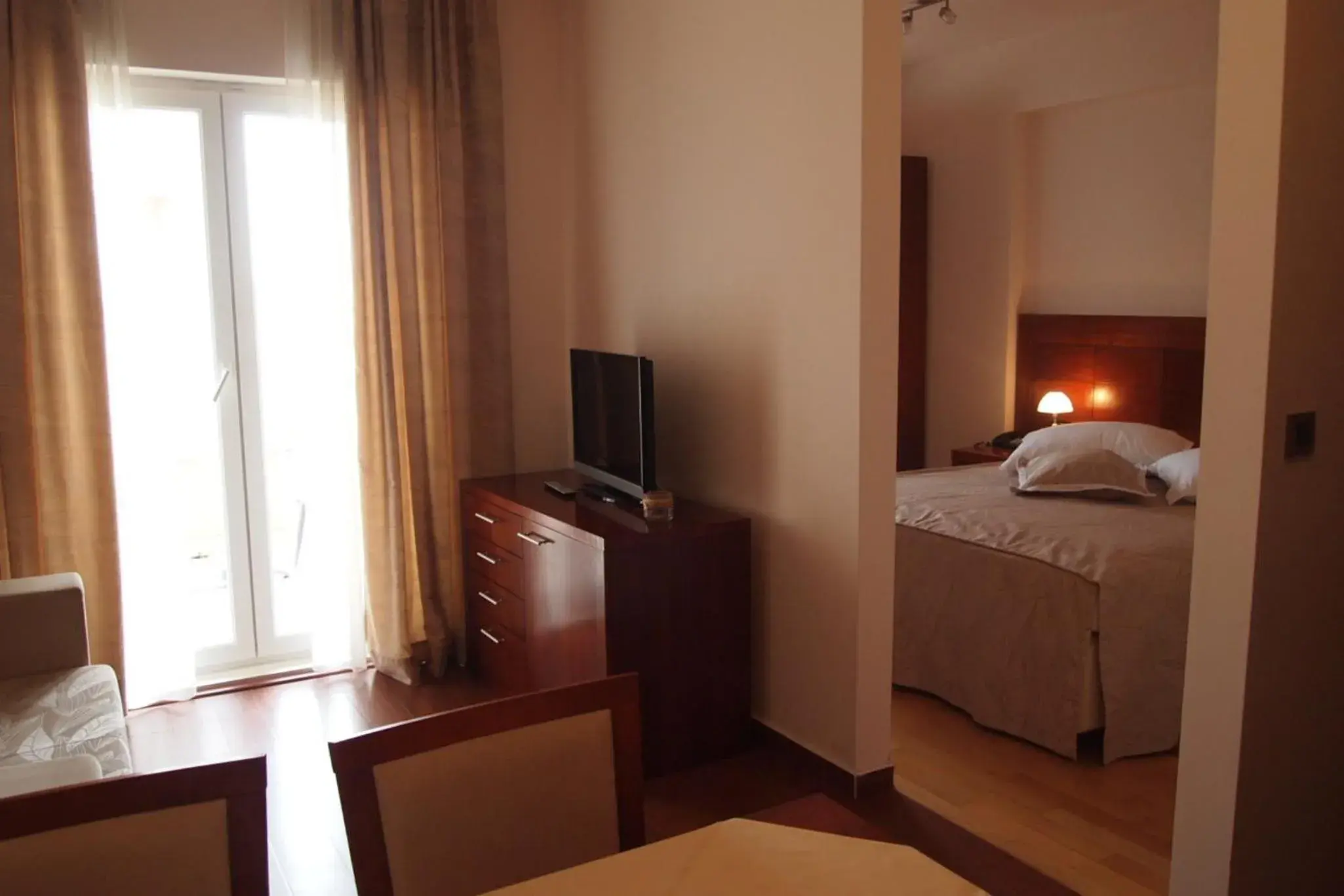 Living room, Bed in Apartments Agava Living room, Bed in Apartments Agava