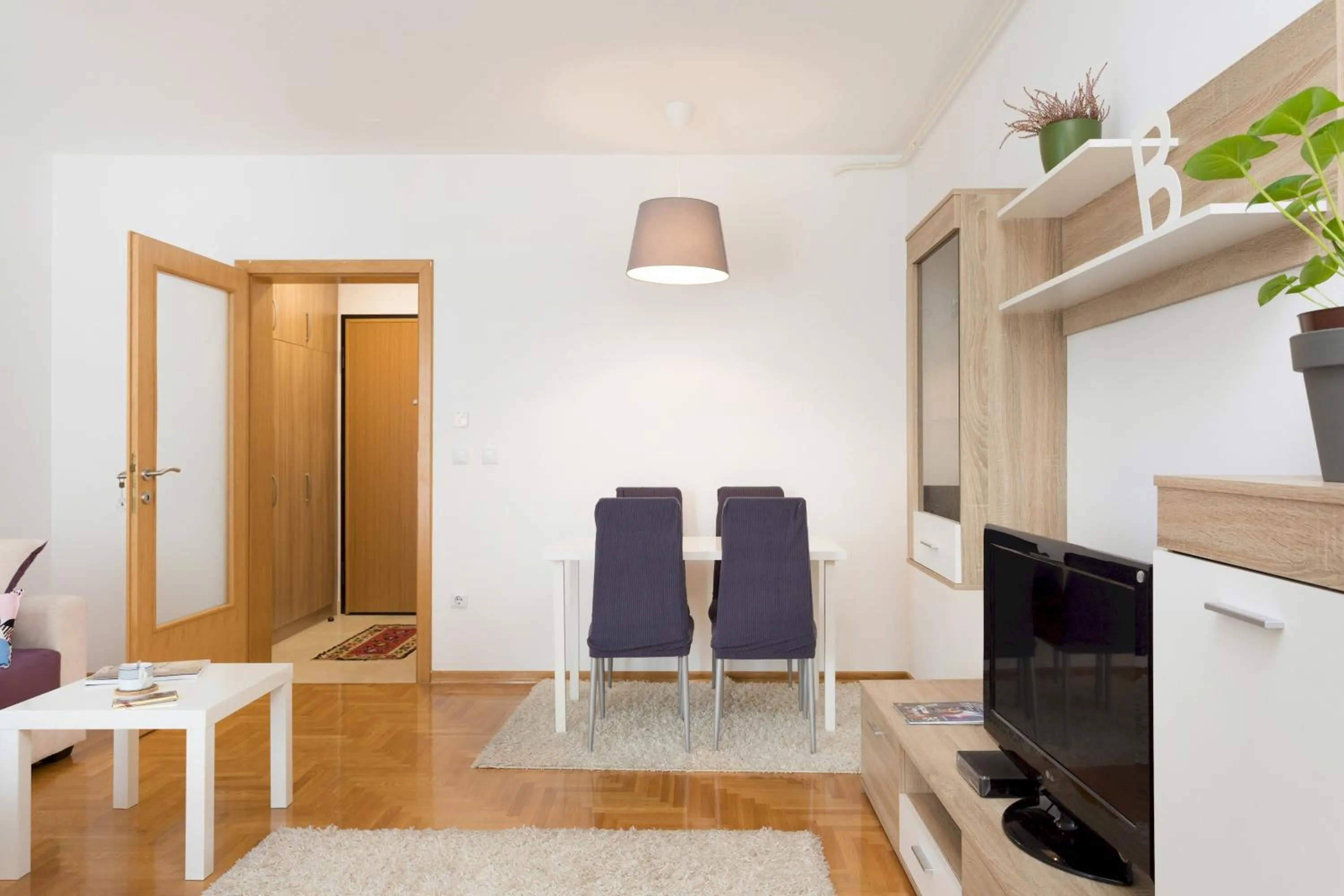 Living room in Cute and Sunny Studio in Zagreb with Balcony & Free Parking