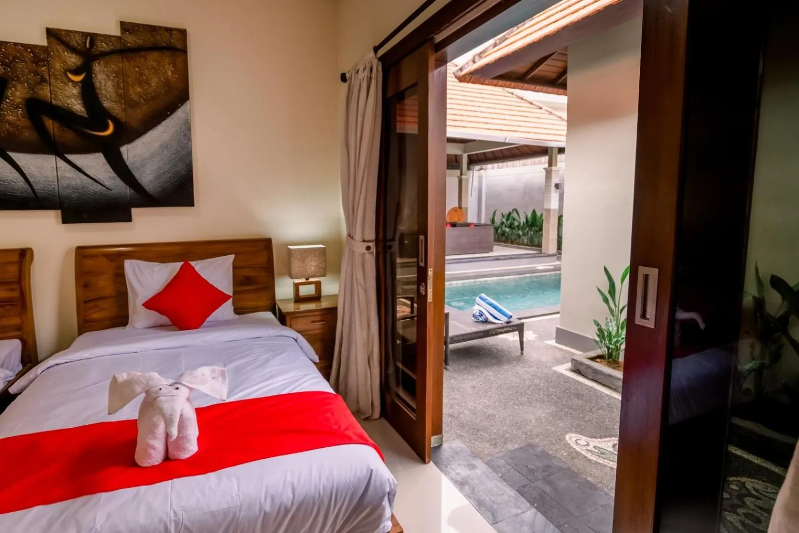 Bed in Taman Bali Villas Dewi Sri