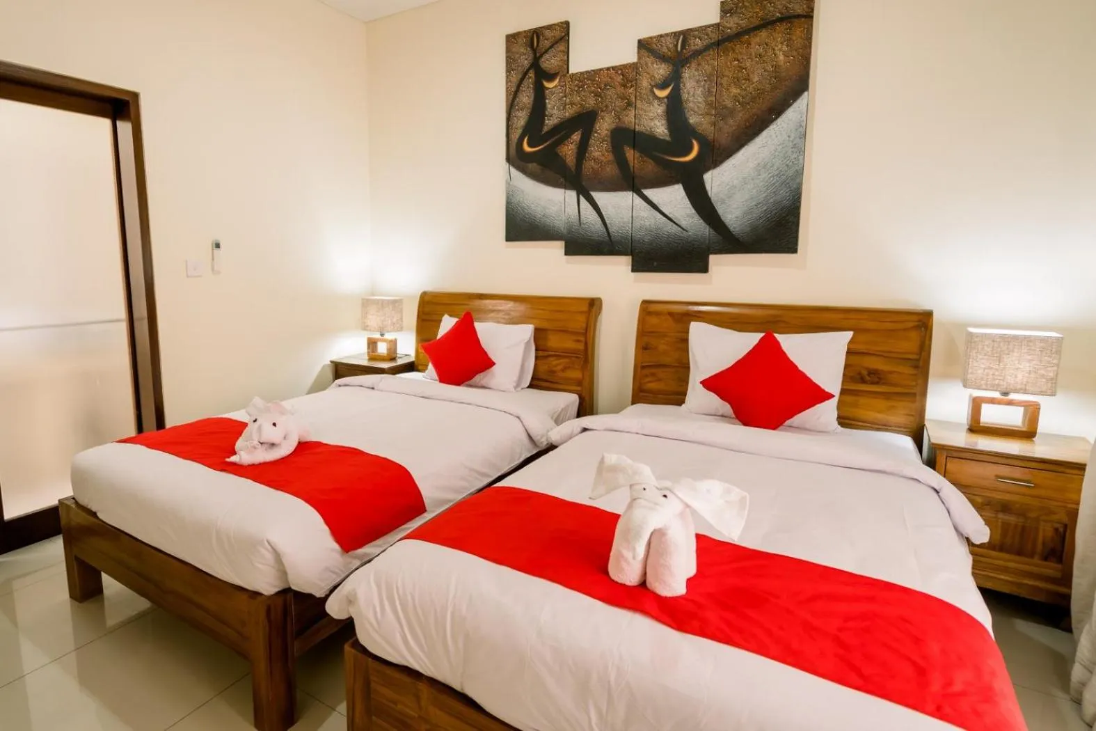 Bed in Taman Bali Villas Dewi Sri