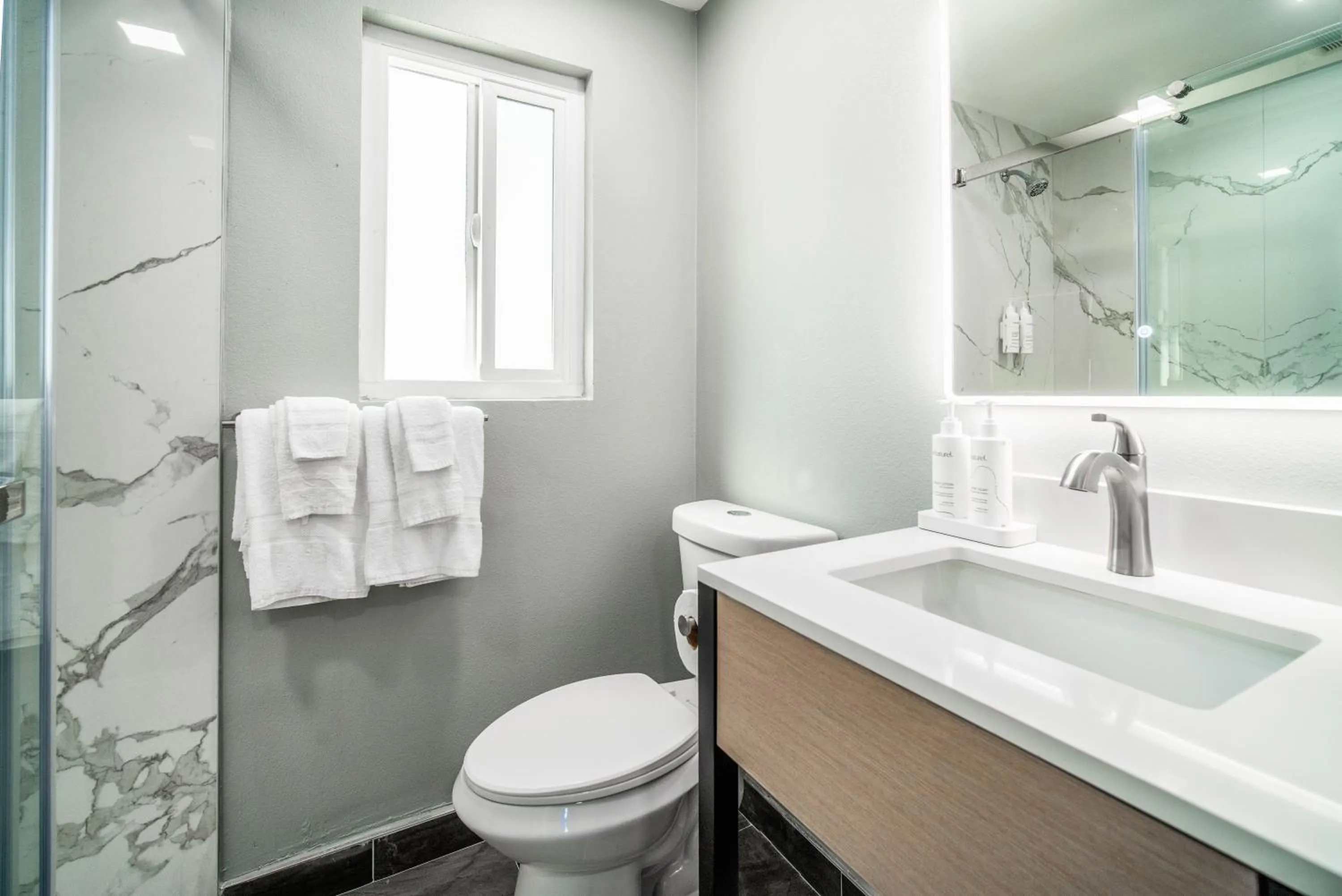 Bathroom in Pacific Inn and Suites