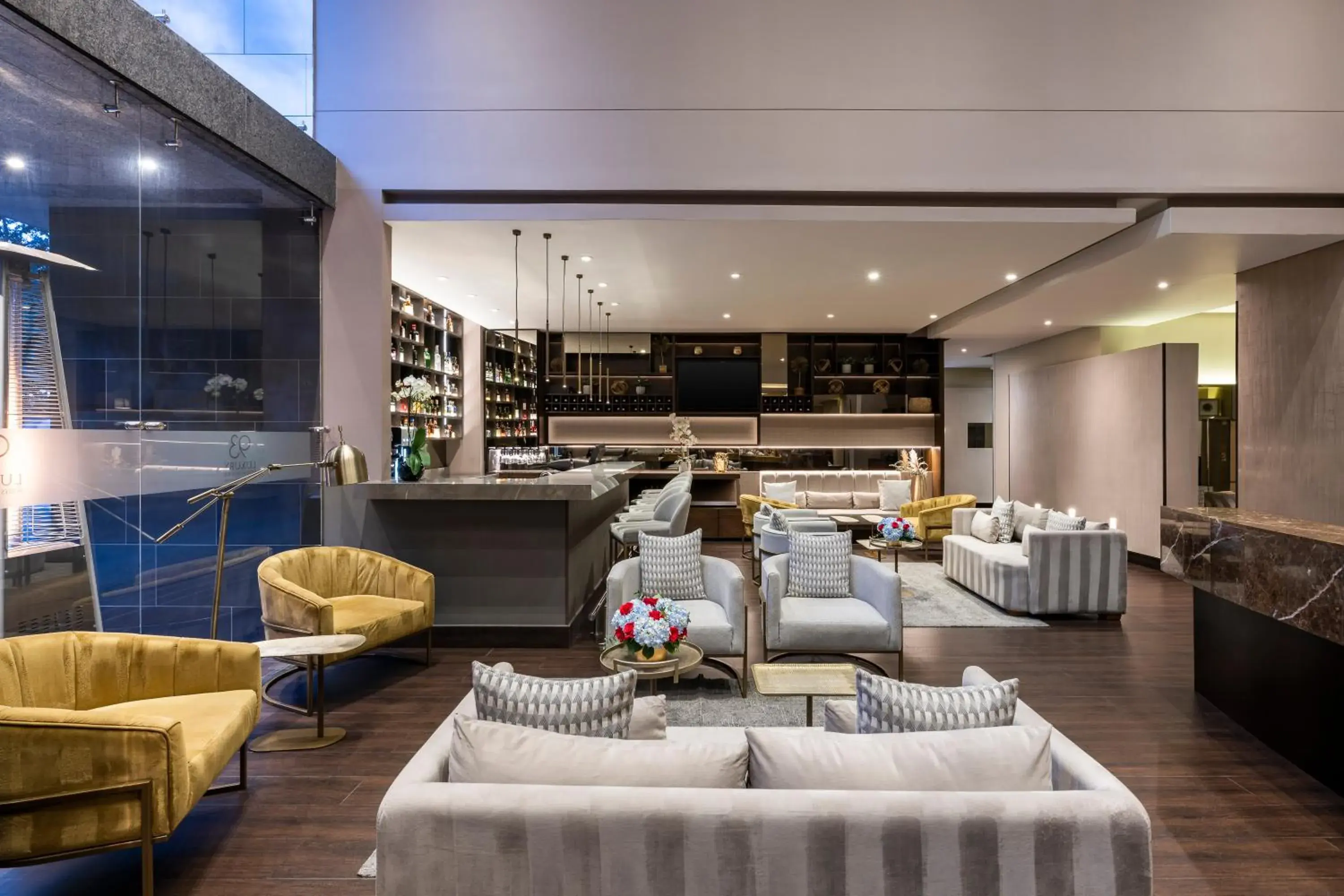 Living room in Hotel 93 Luxury Suites by Preferred Living room in Hotel 93 Luxury Suites by Preferred