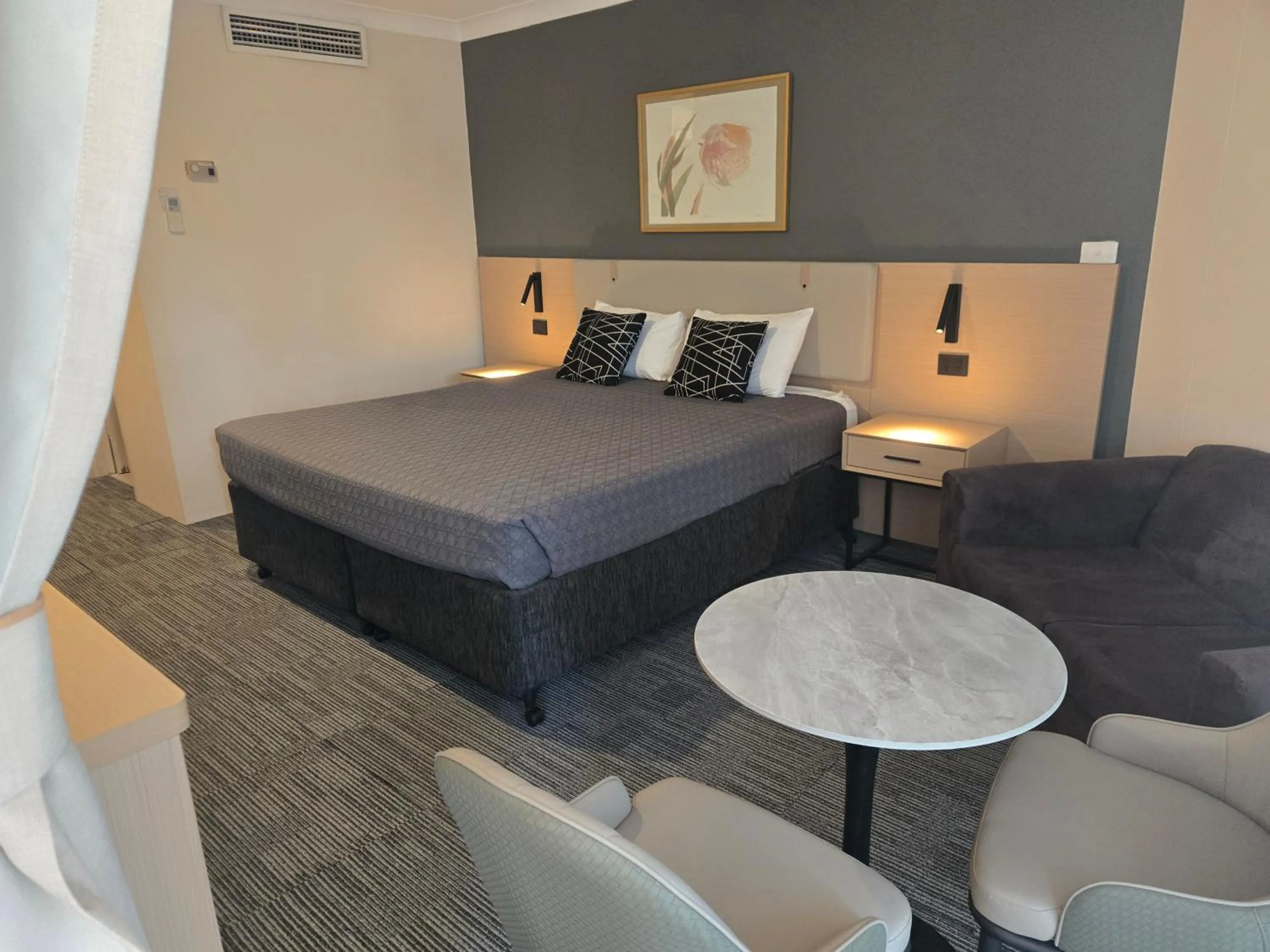 Bed in Charbonnier Motor Inn