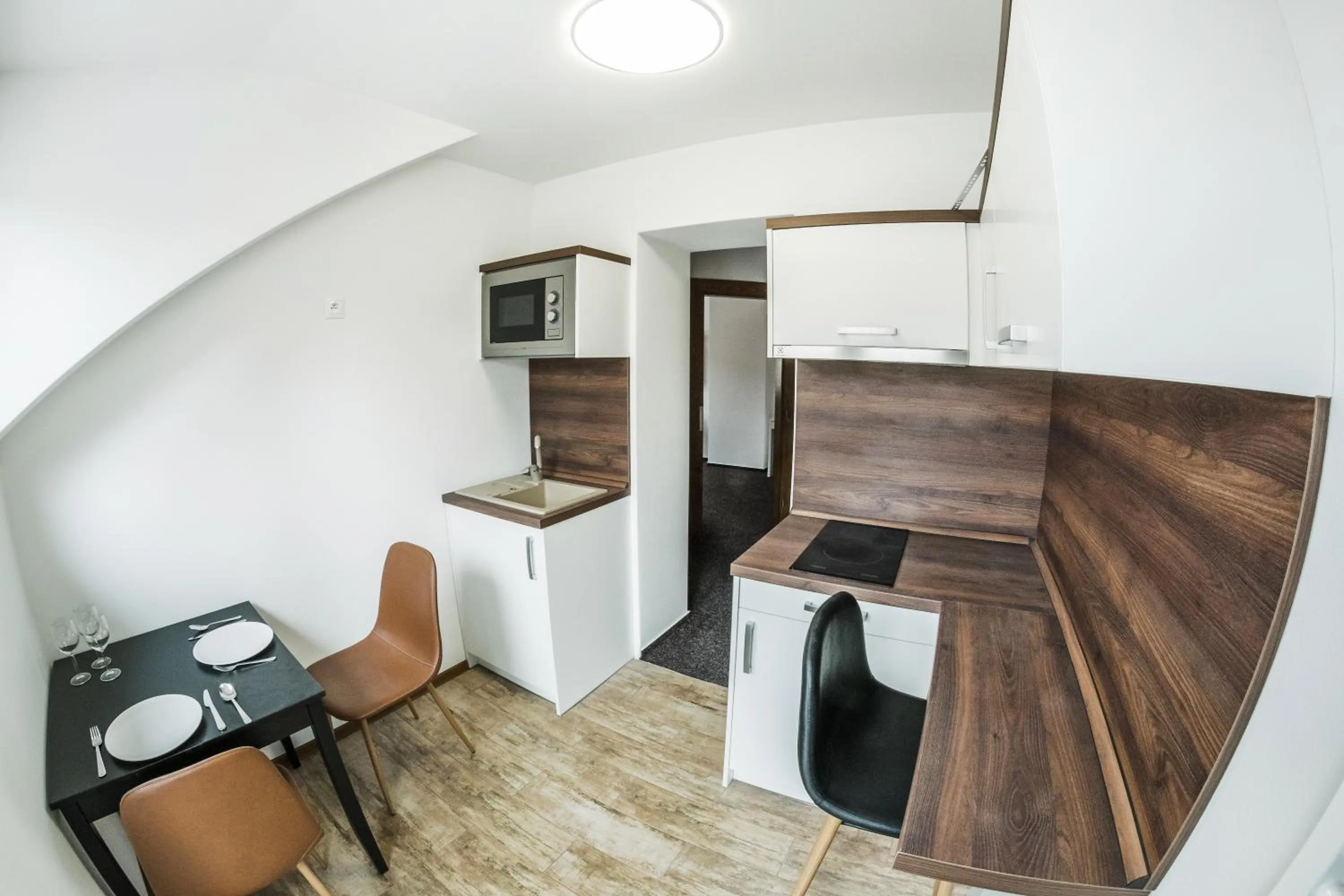 Kitchen or kitchenette in VILLA CENTRUM APARTMÁNY s RAŇAJKAMI A SAUNOU