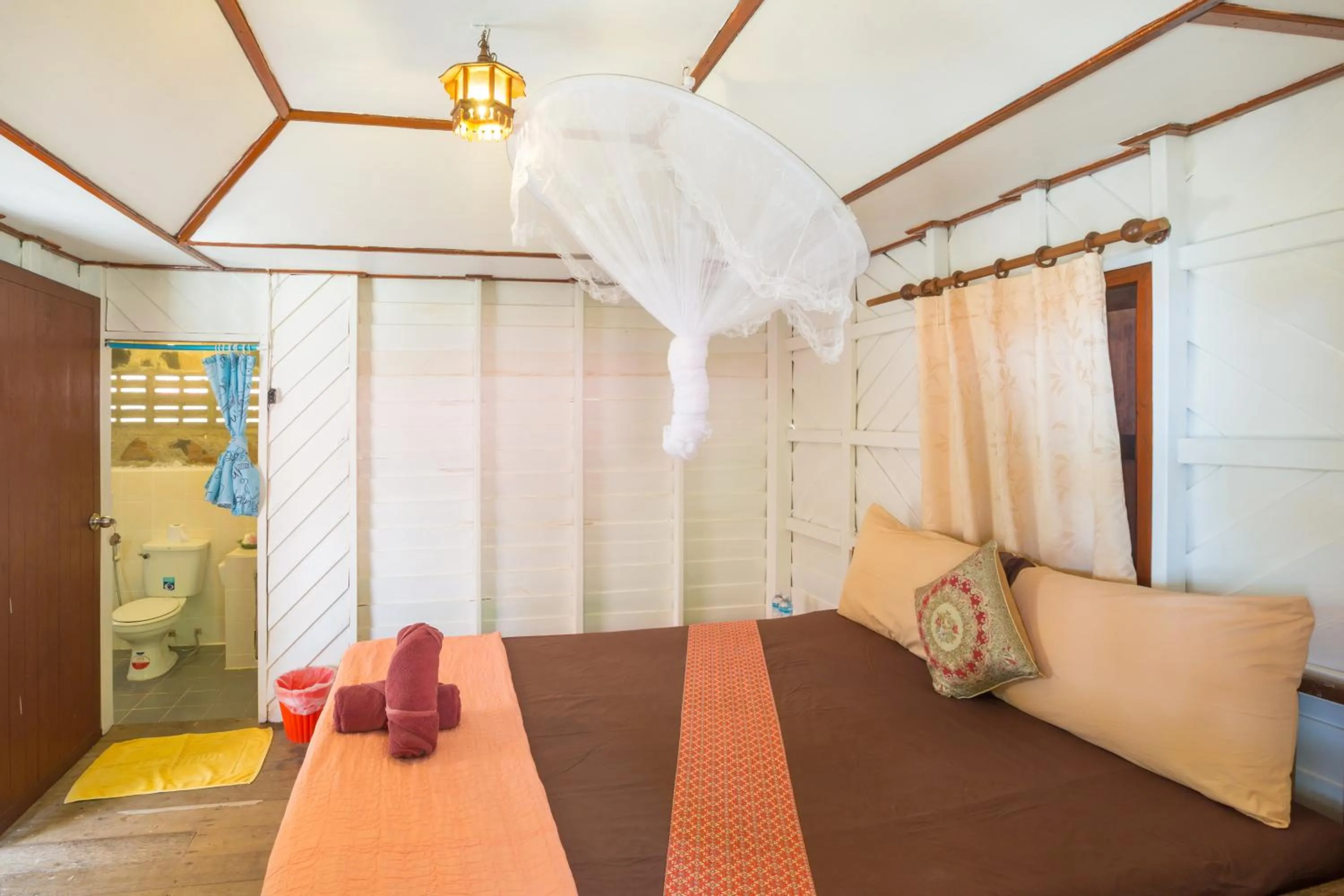 Bed in Bottle Beach 1 Resort