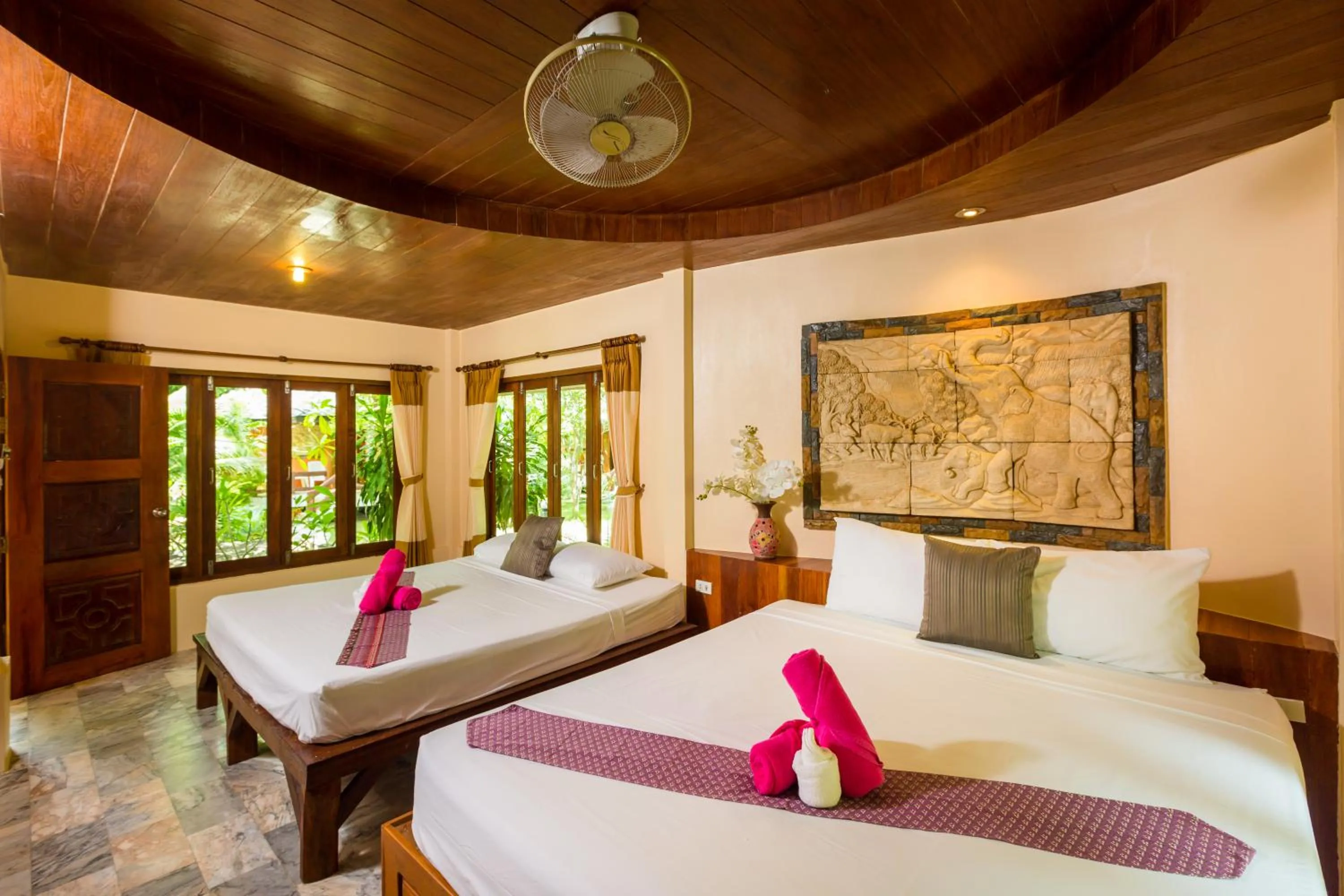 Bed in Bottle Beach 1 Resort