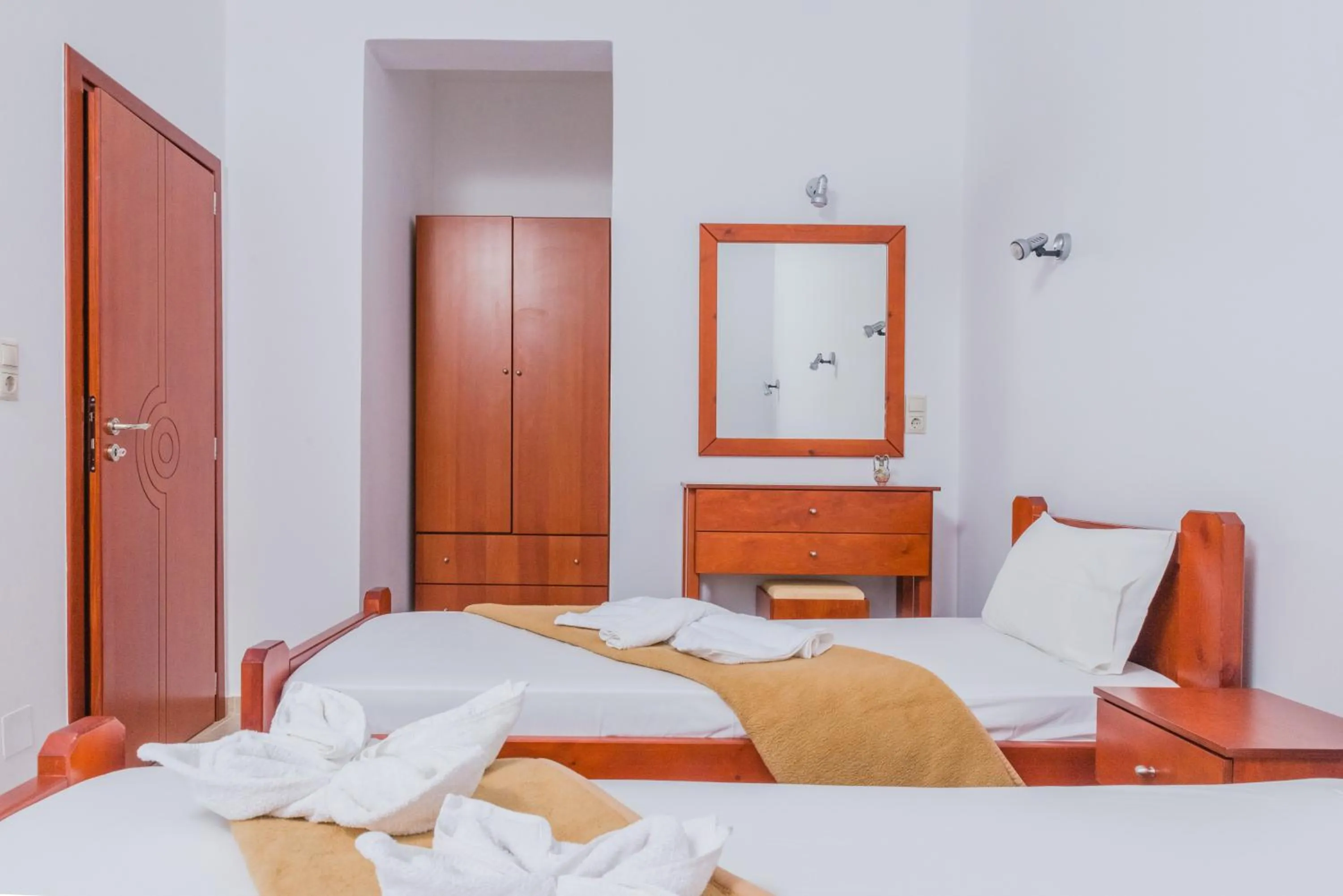 Bed in Arsinoi Studios and Apartments