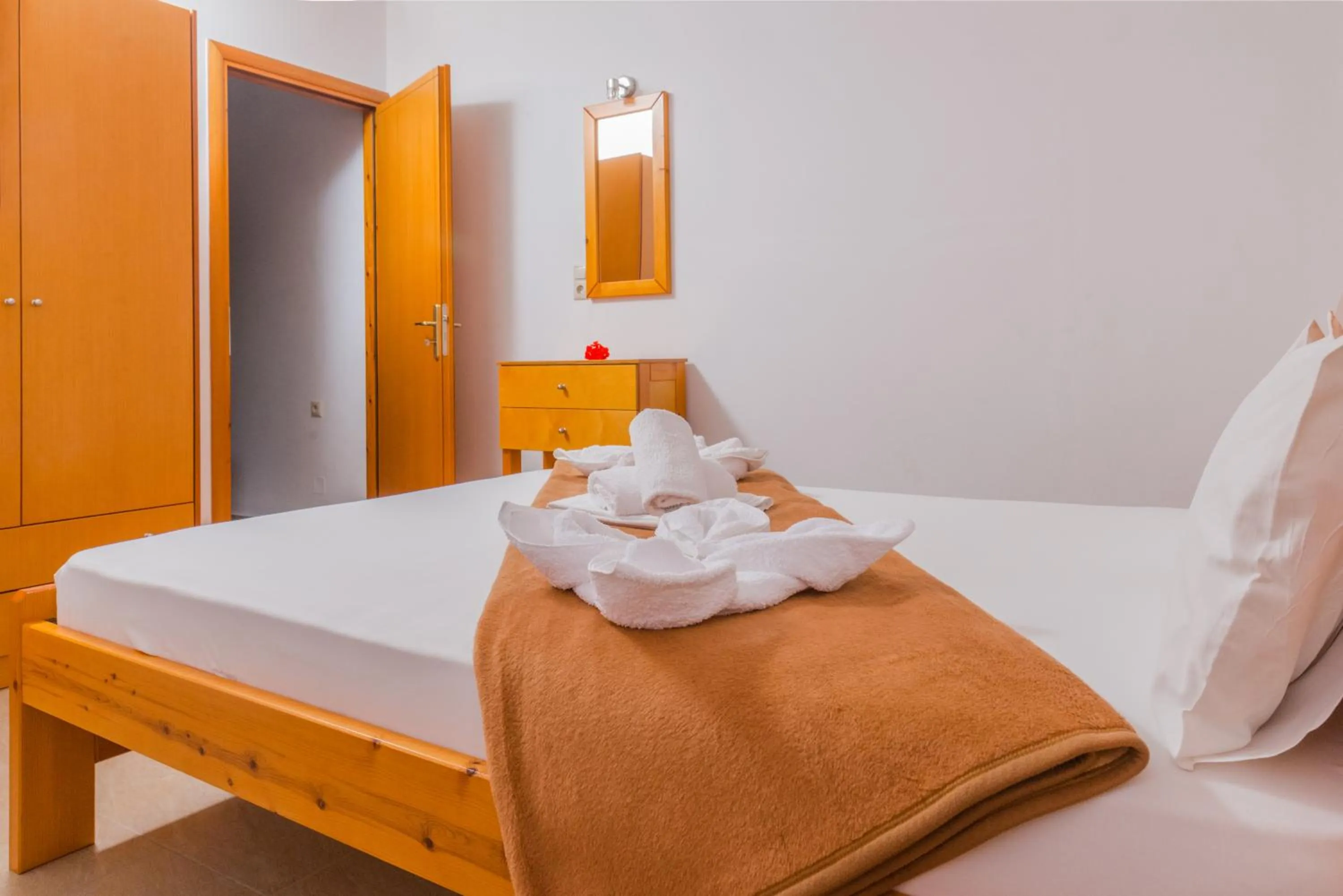 Bed in Arsinoi Studios and Apartments