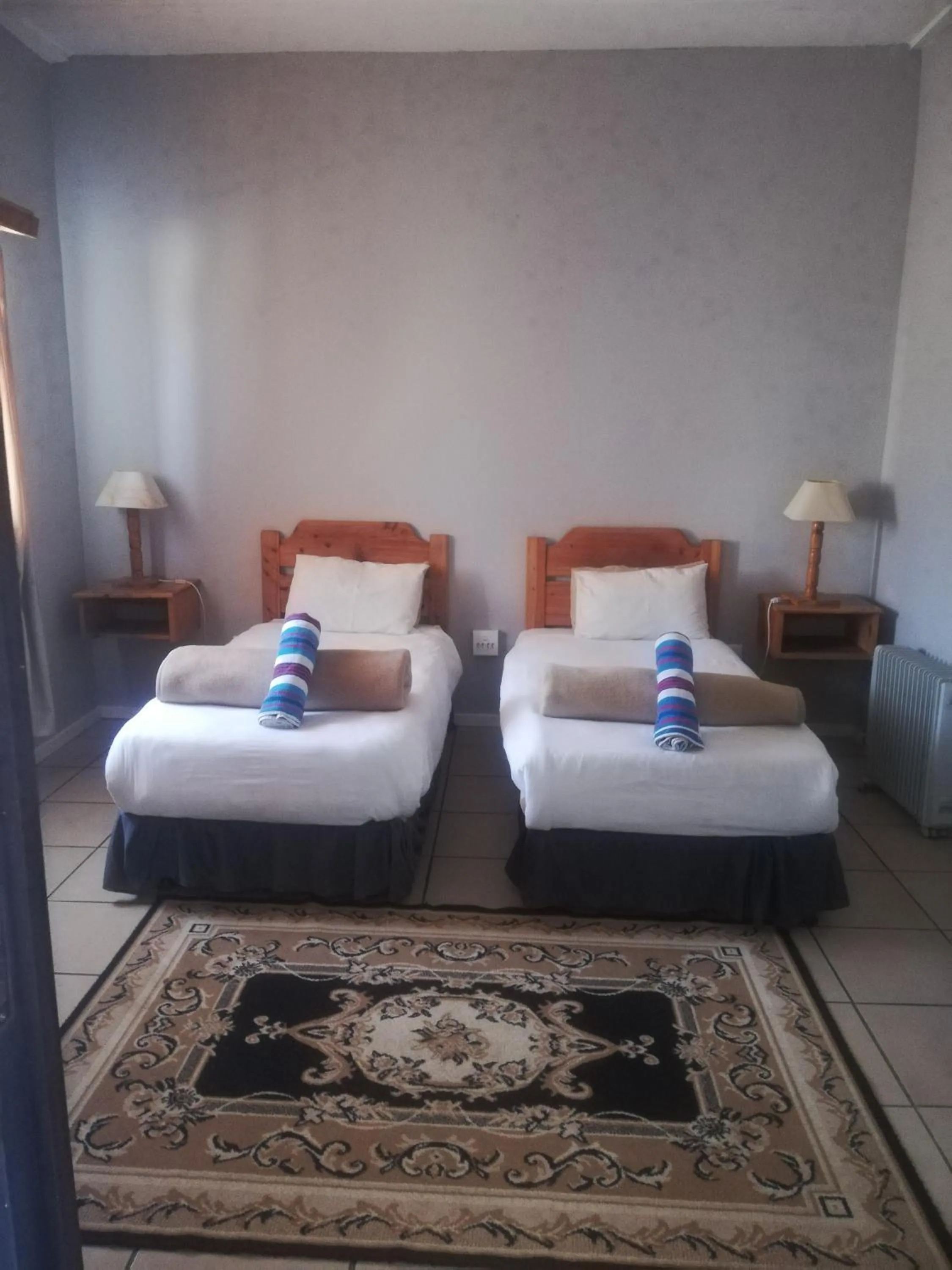 Bedroom in The Old Mill Hotel