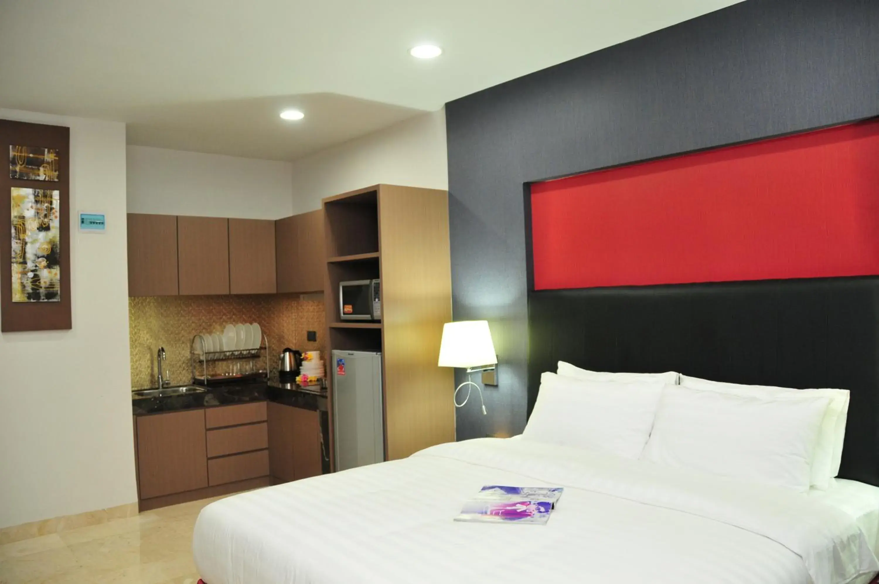 Bed in The Centro Hotel & Residence By Orchardz Bed in The Centro Hotel & Residence By Orchardz