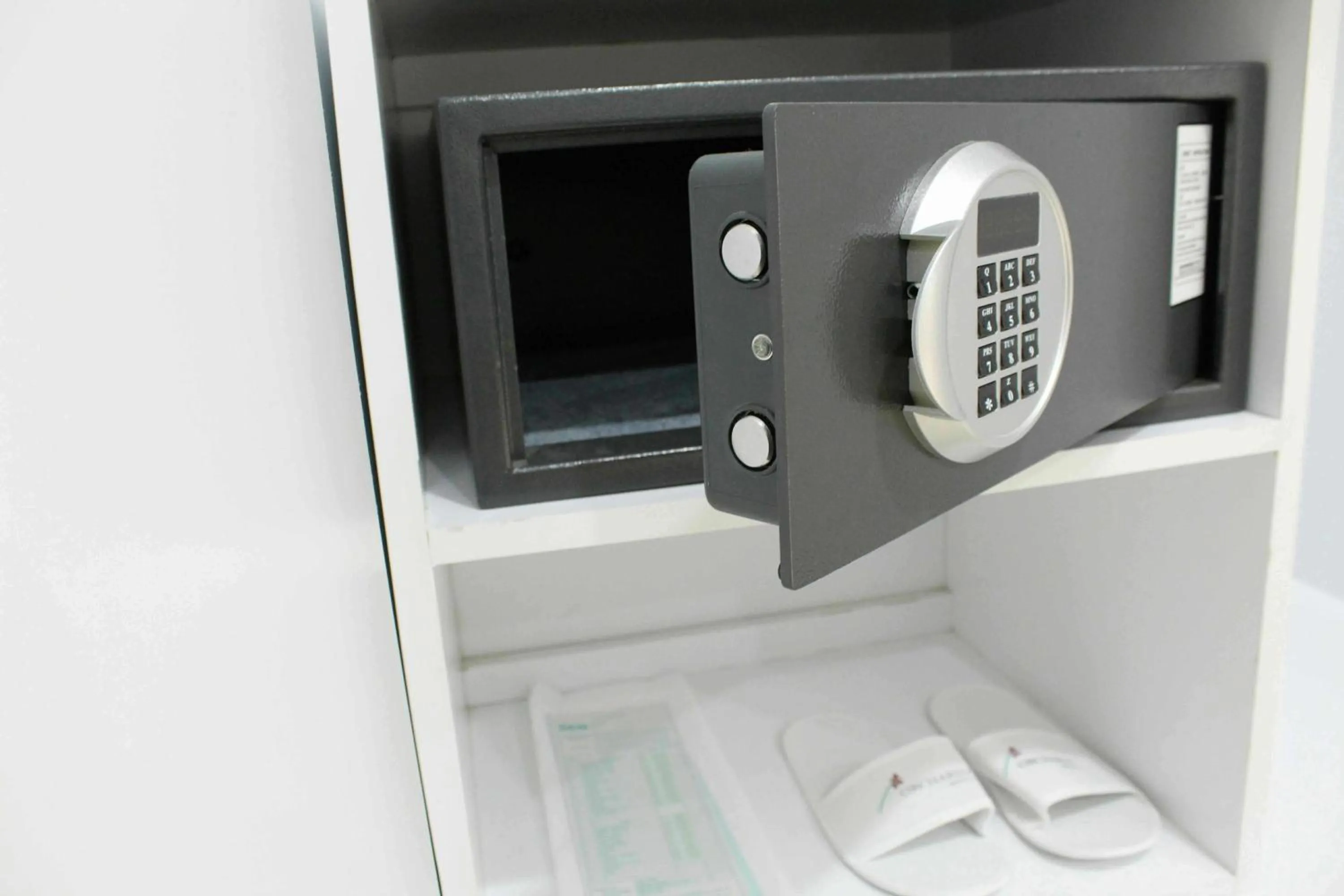 Bedroom in The Centro Hotel & Residence By Orchardz