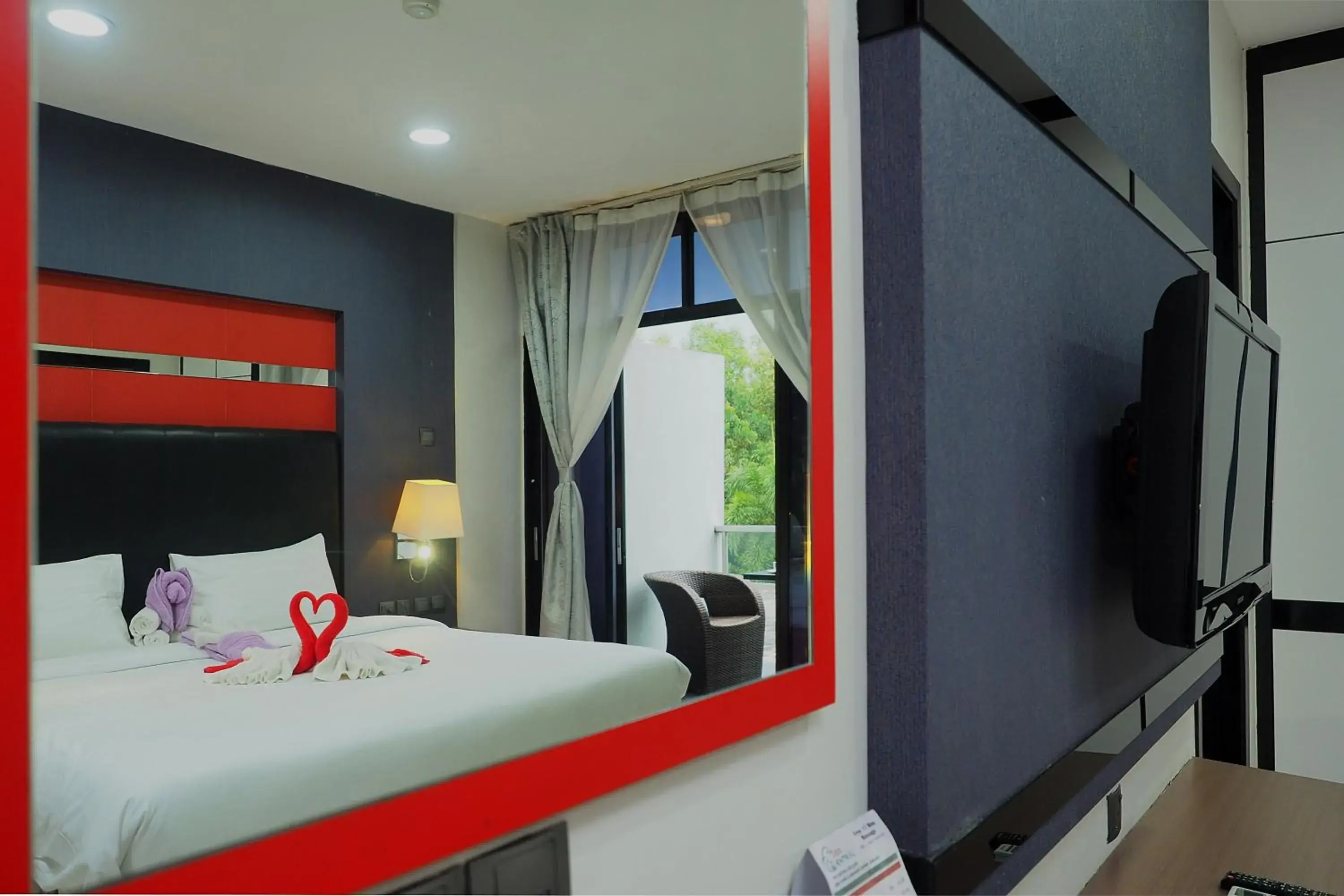 Bed in The Centro Hotel & Residence By Orchardz Bed in The Centro Hotel & Residence By Orchardz