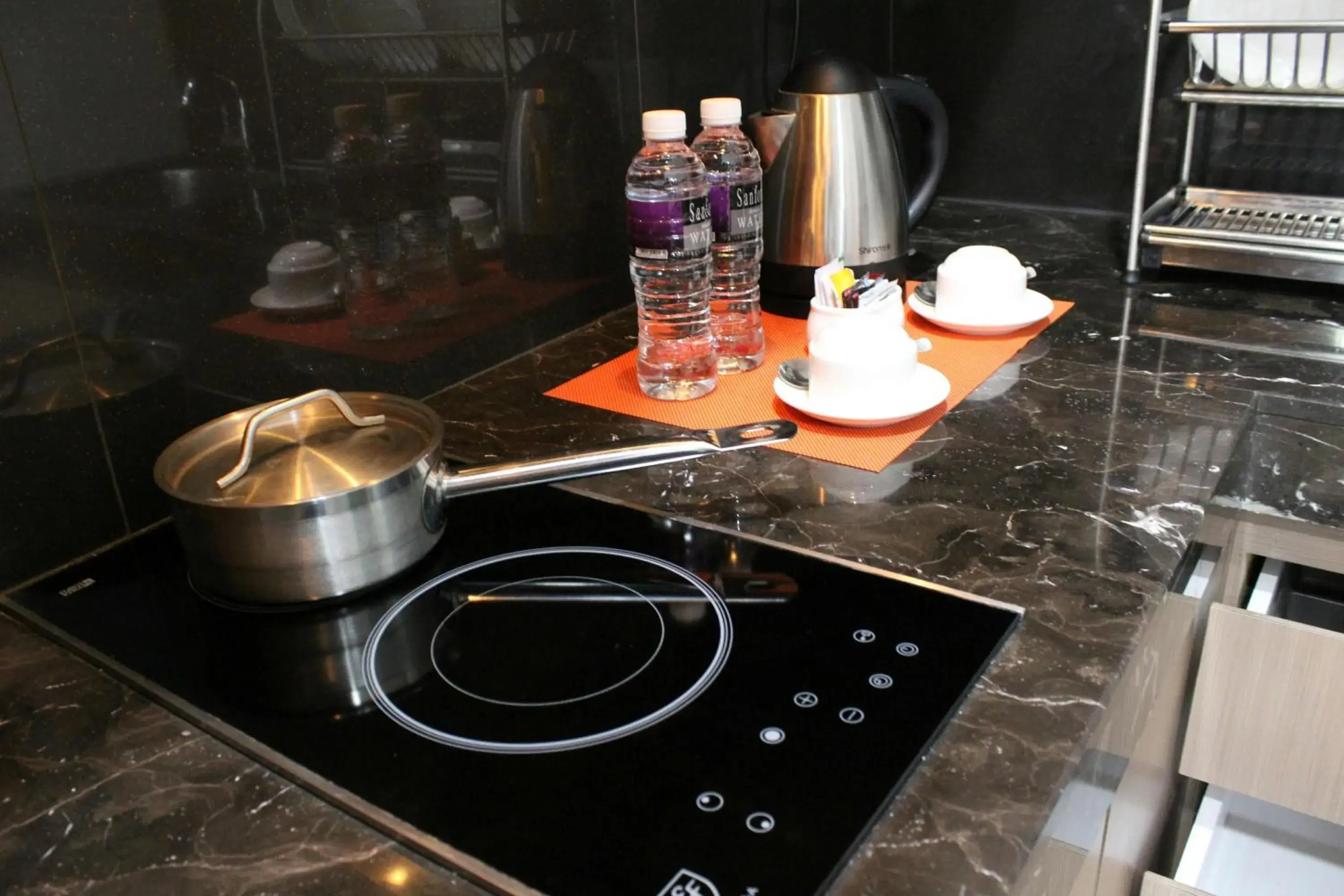 Kitchen or kitchenette in The Centro Hotel & Residence By Orchardz Kitchen or kitchenette in The Centro Hotel & Residence By Orchardz