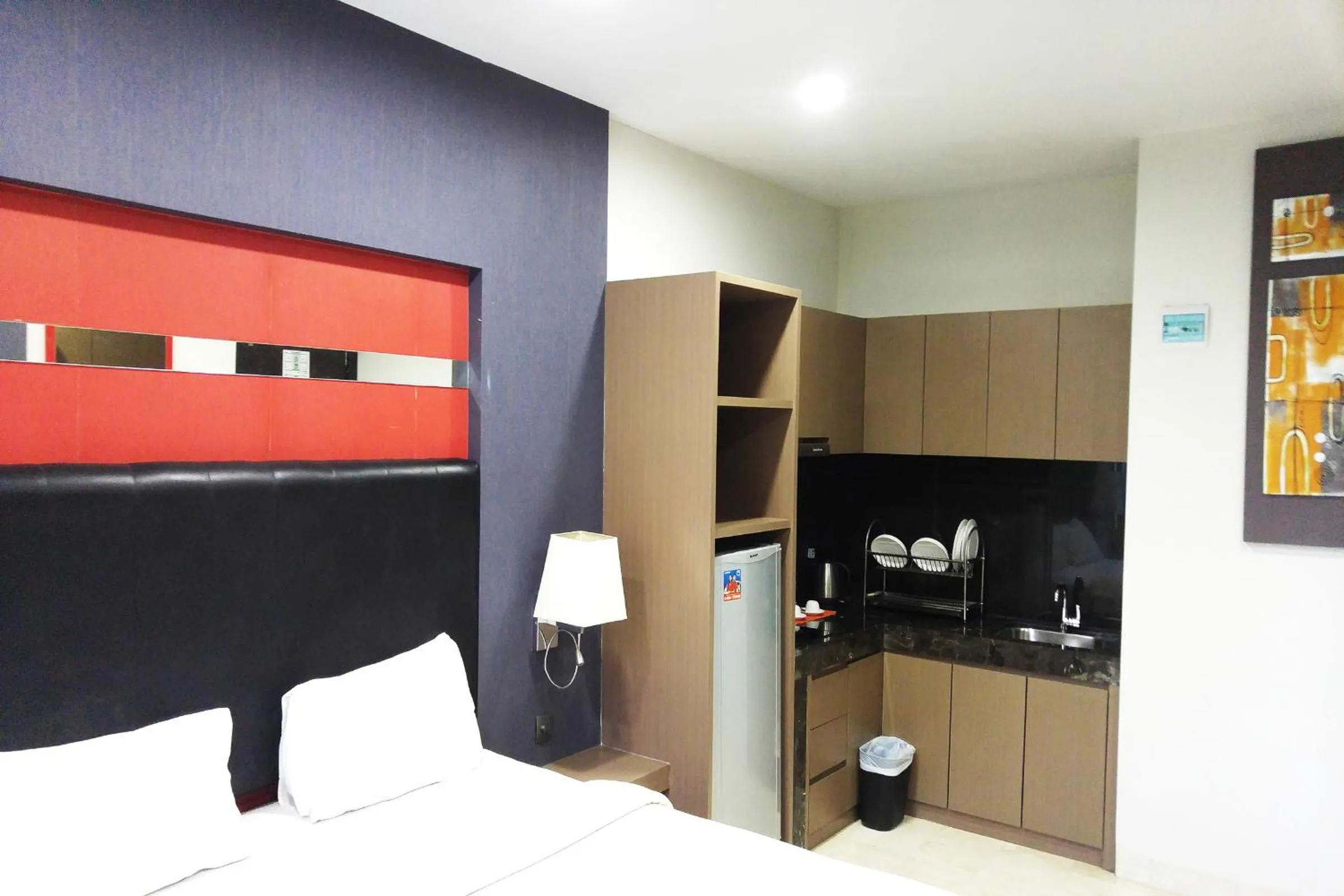 Coffee/tea facilities, Bed in The Centro Hotel & Residence By Orchardz