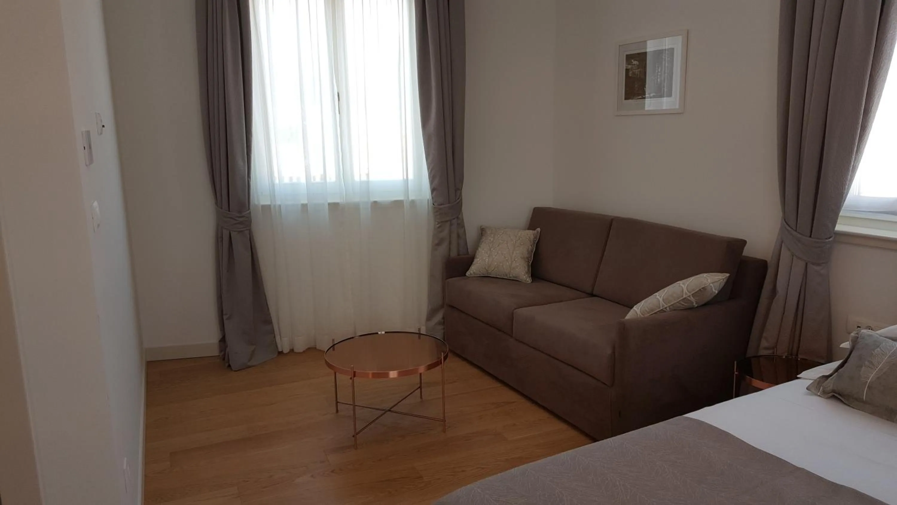 Seating area, Bed in Residence Stine