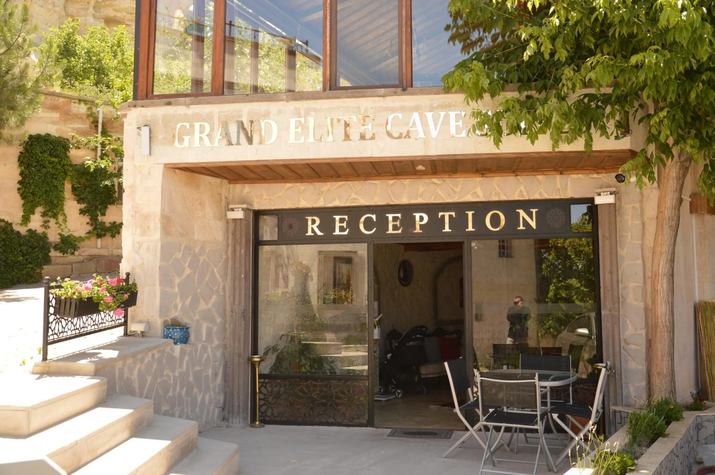 Property logo or sign in Grand Elite Cave Suites