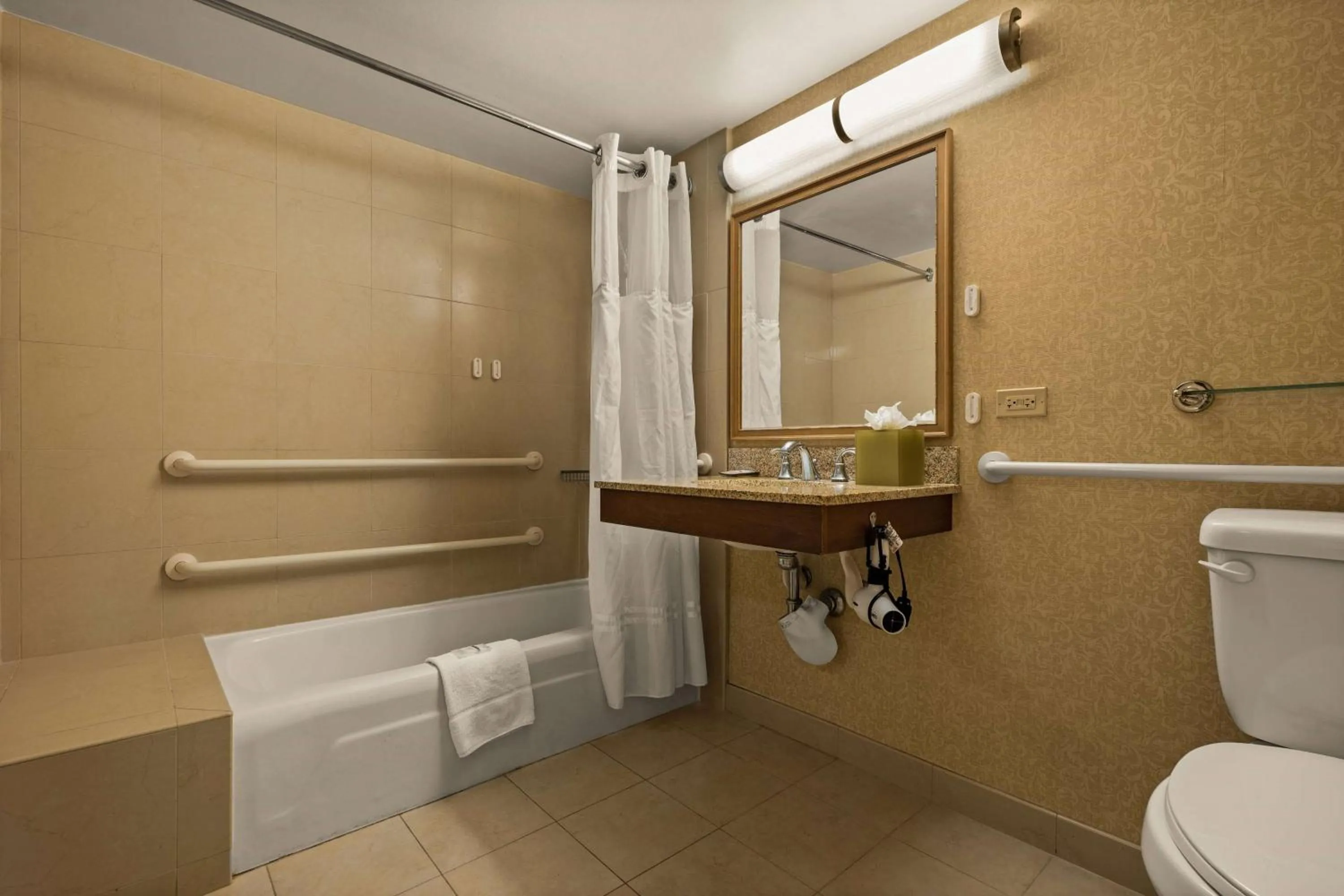 Bathroom in Airport Honolulu Hotel, Trademark Collection by Wyndham