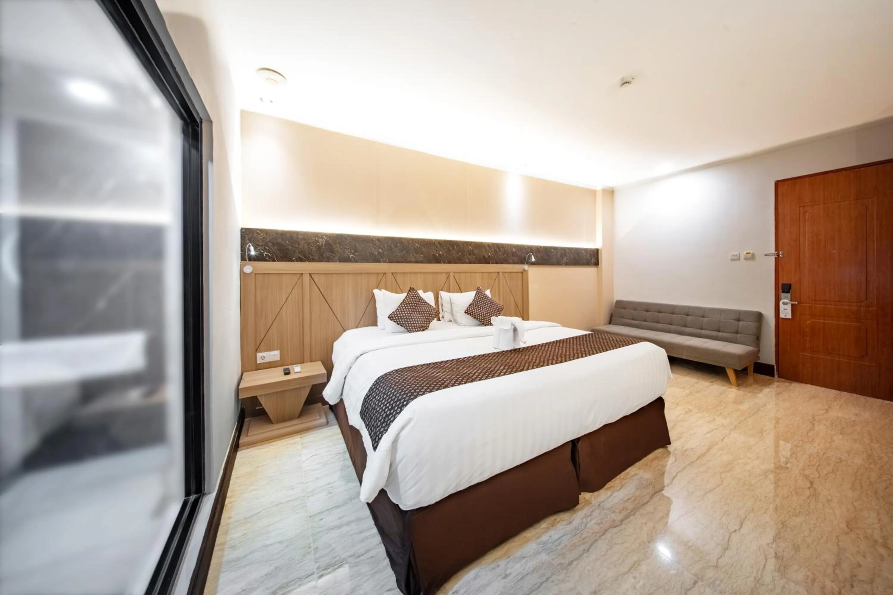 Bed in Grand Istana Rama Hotel