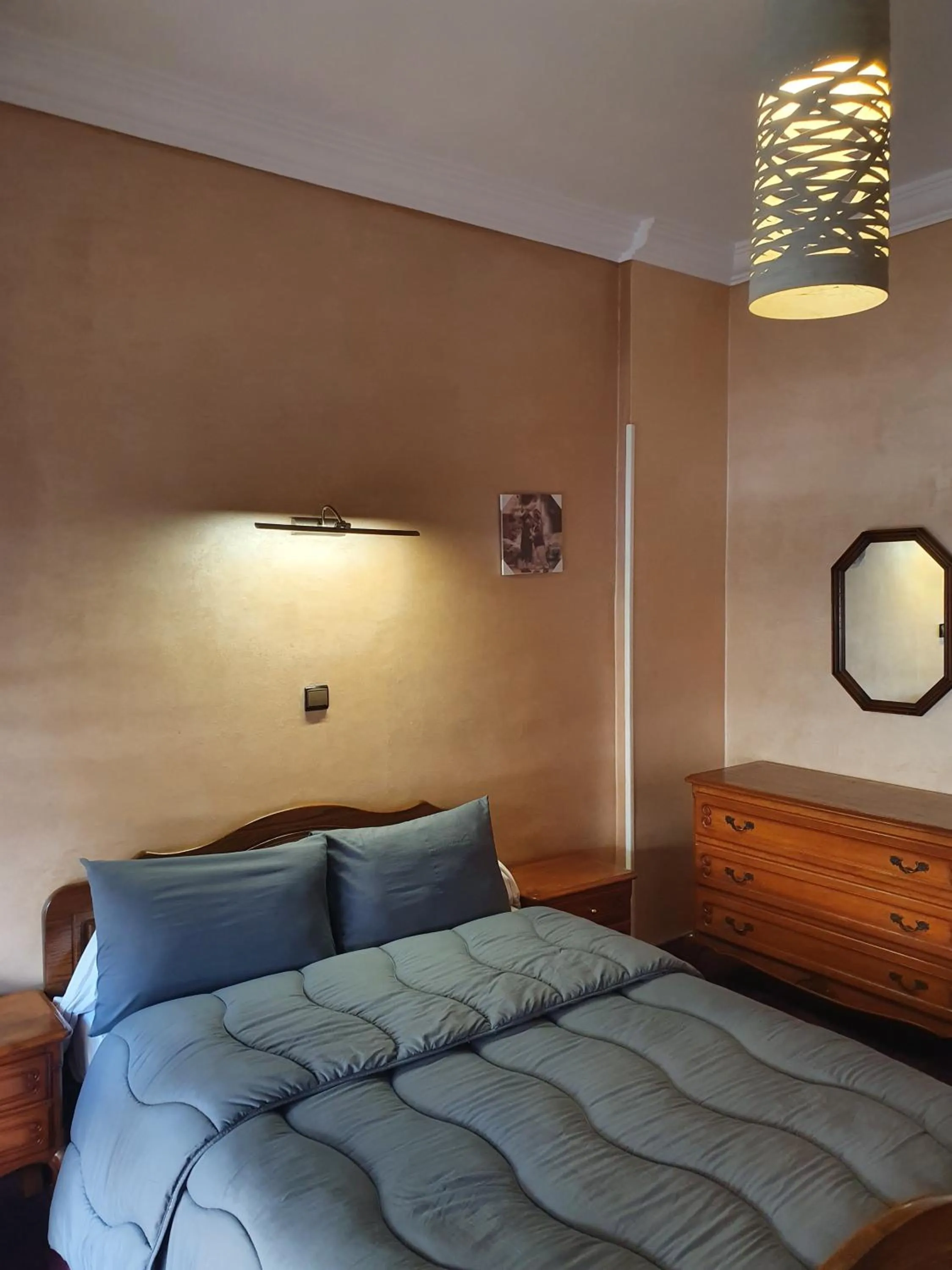 Bed in Ambassy Hotel