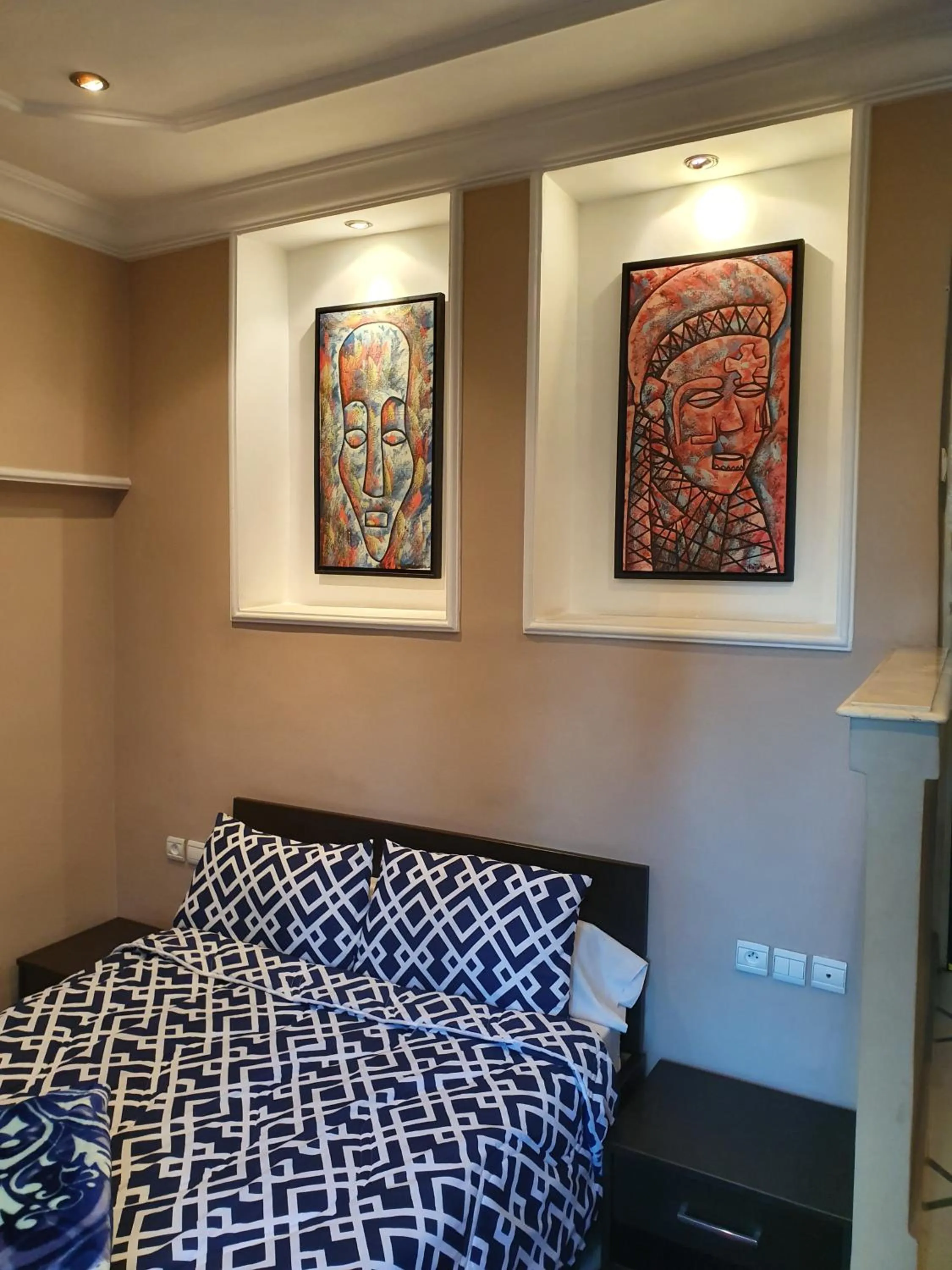 Bed in Ambassy Hotel