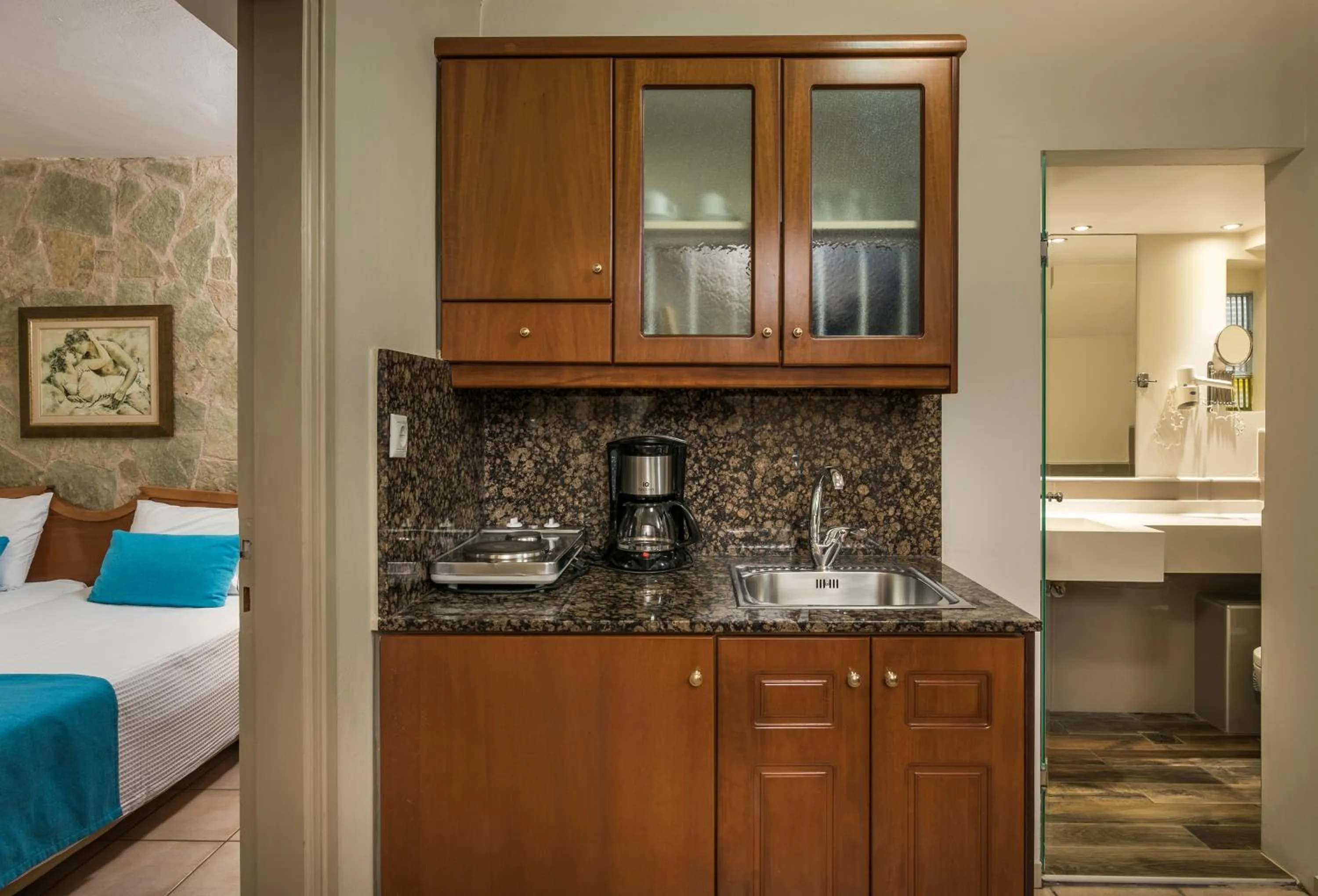 Kitchen or kitchenette, Bed in Elotis Suites