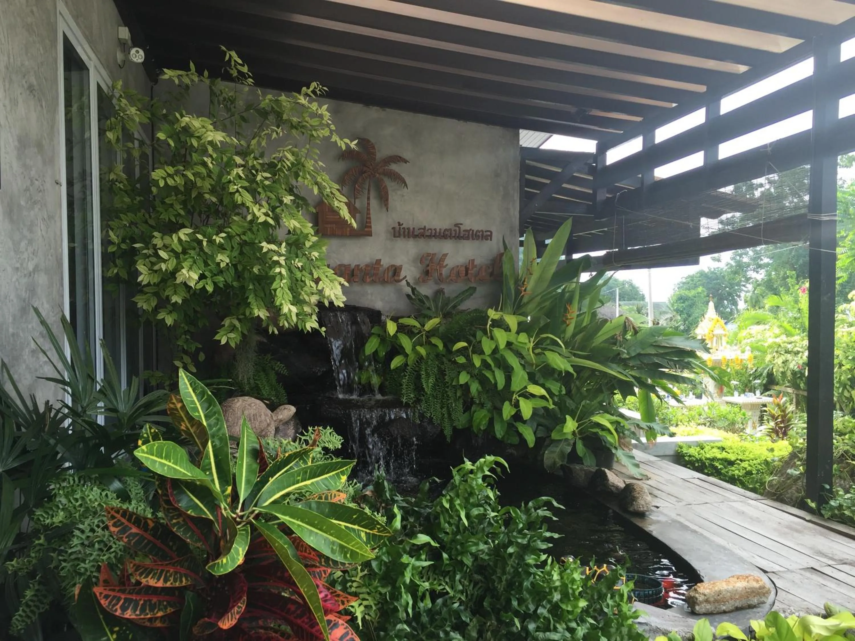 Property logo or sign in Baan Suan Ta Hotel