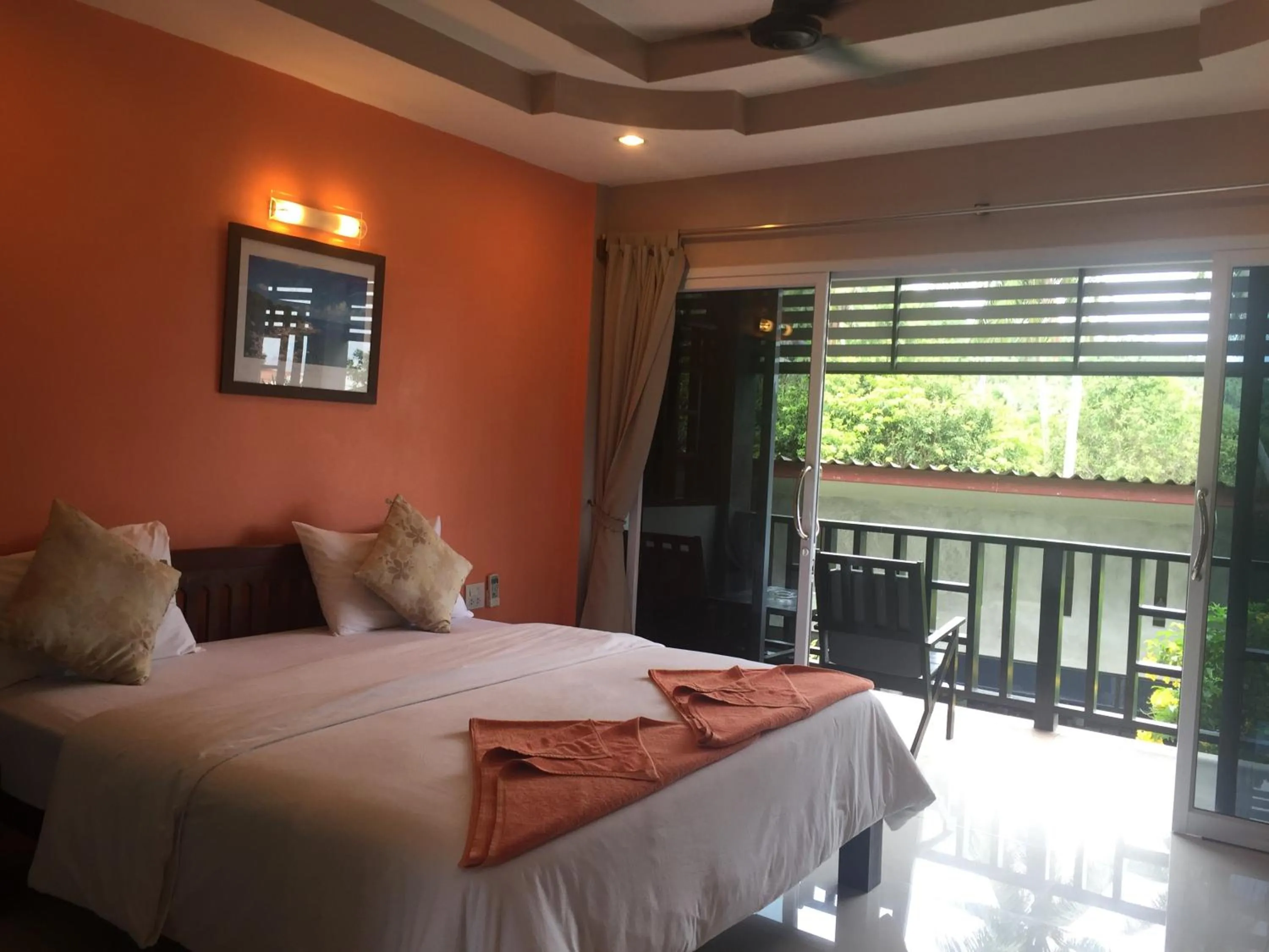 Decorative detail, Bed in Baan Suan Ta Hotel