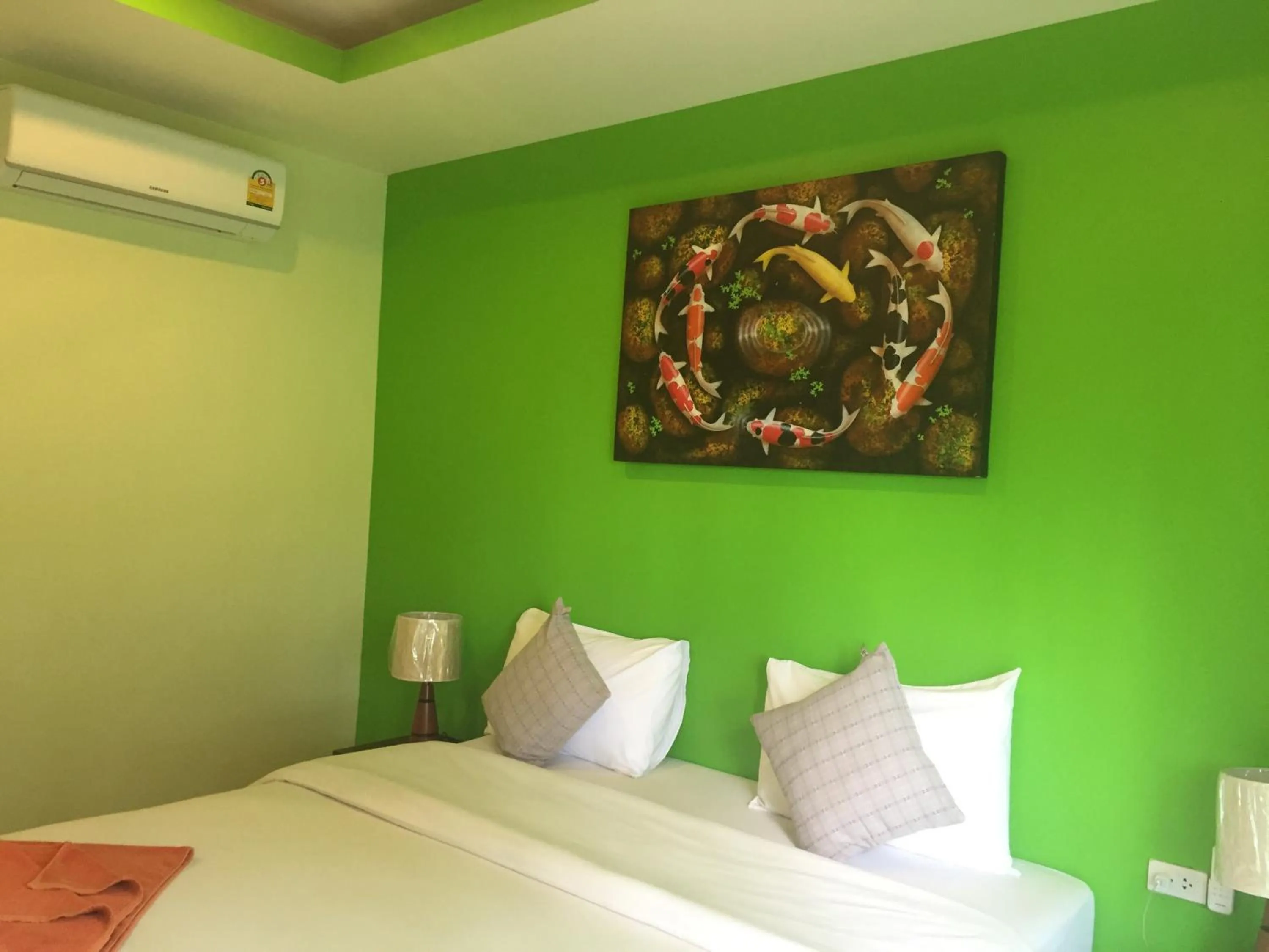 Decorative detail, Bed in Baan Suan Ta Hotel