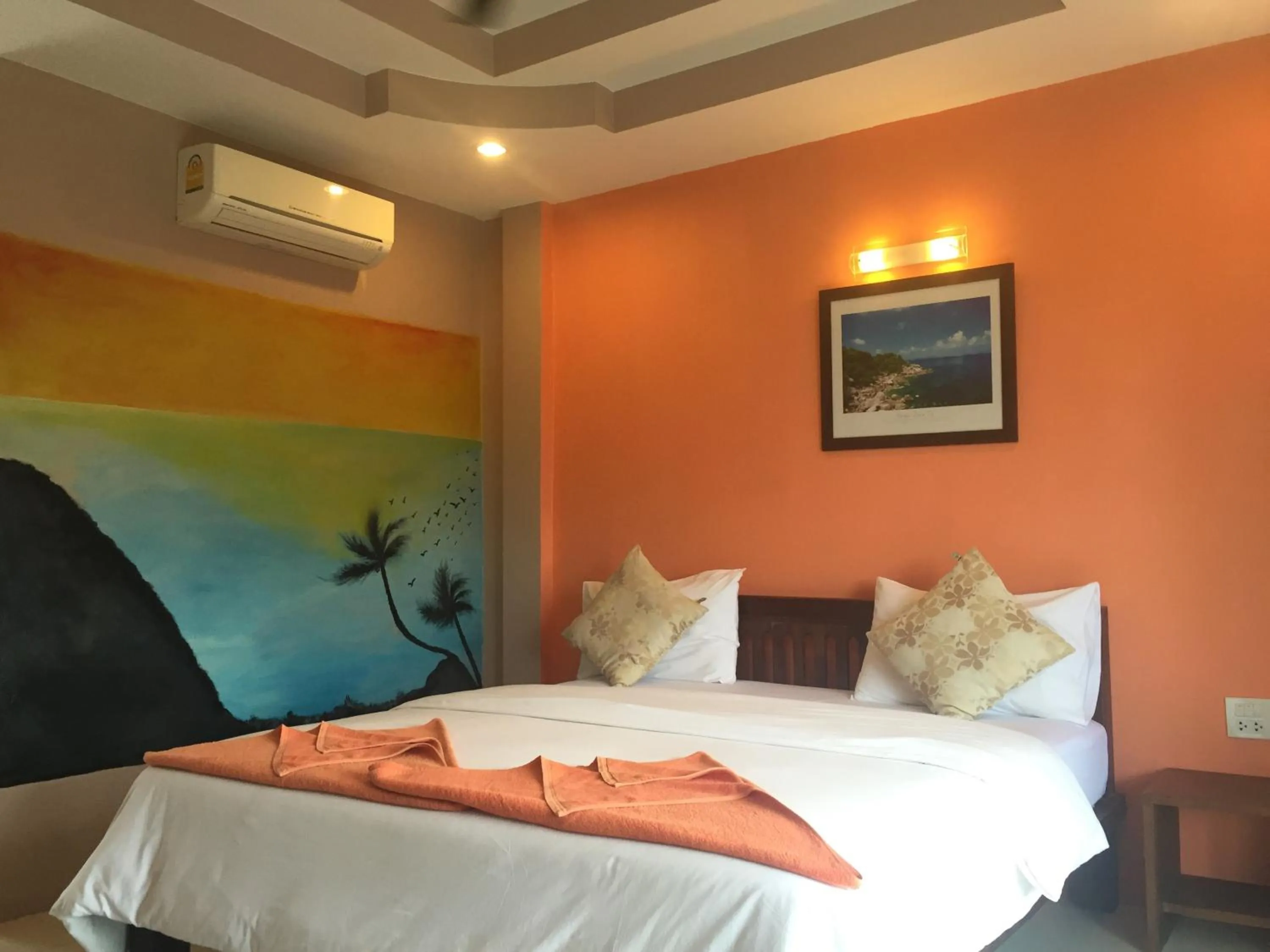 Bed in Baan Suan Ta Hotel