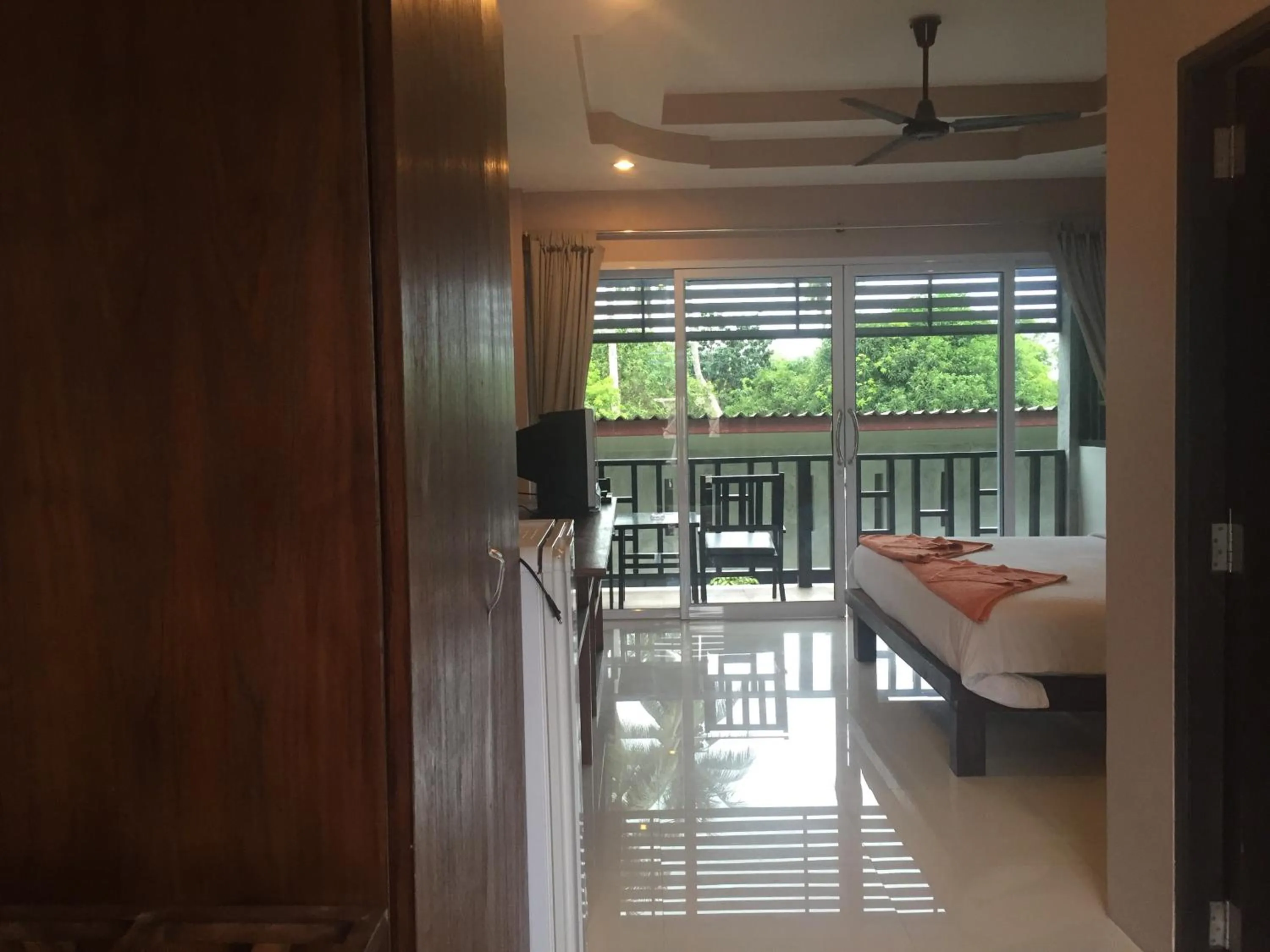 Bed in Baan Suan Ta Hotel