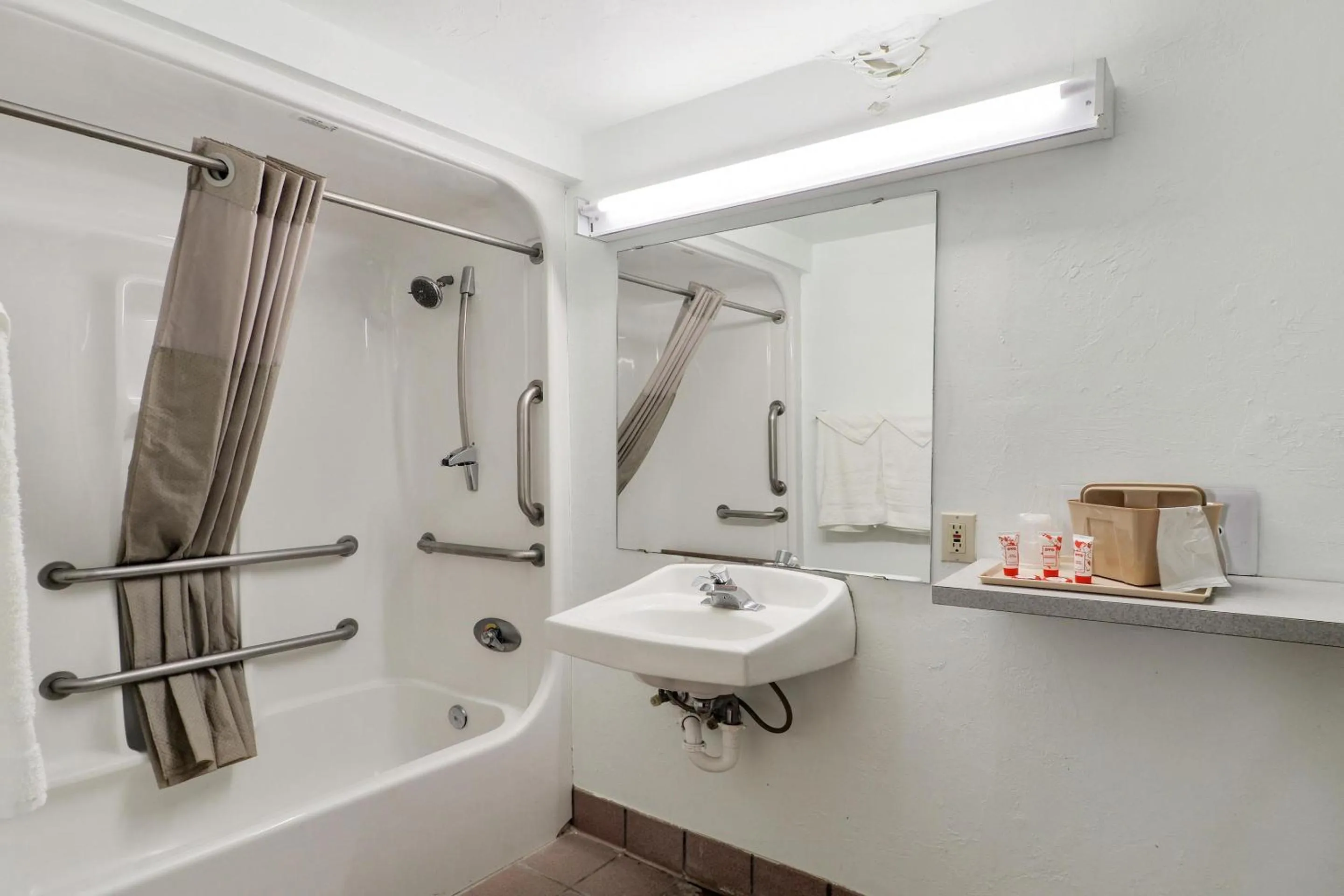 Bathroom in Lonestar Inn & Suites, Erick OK Hwy 40 BY OYO