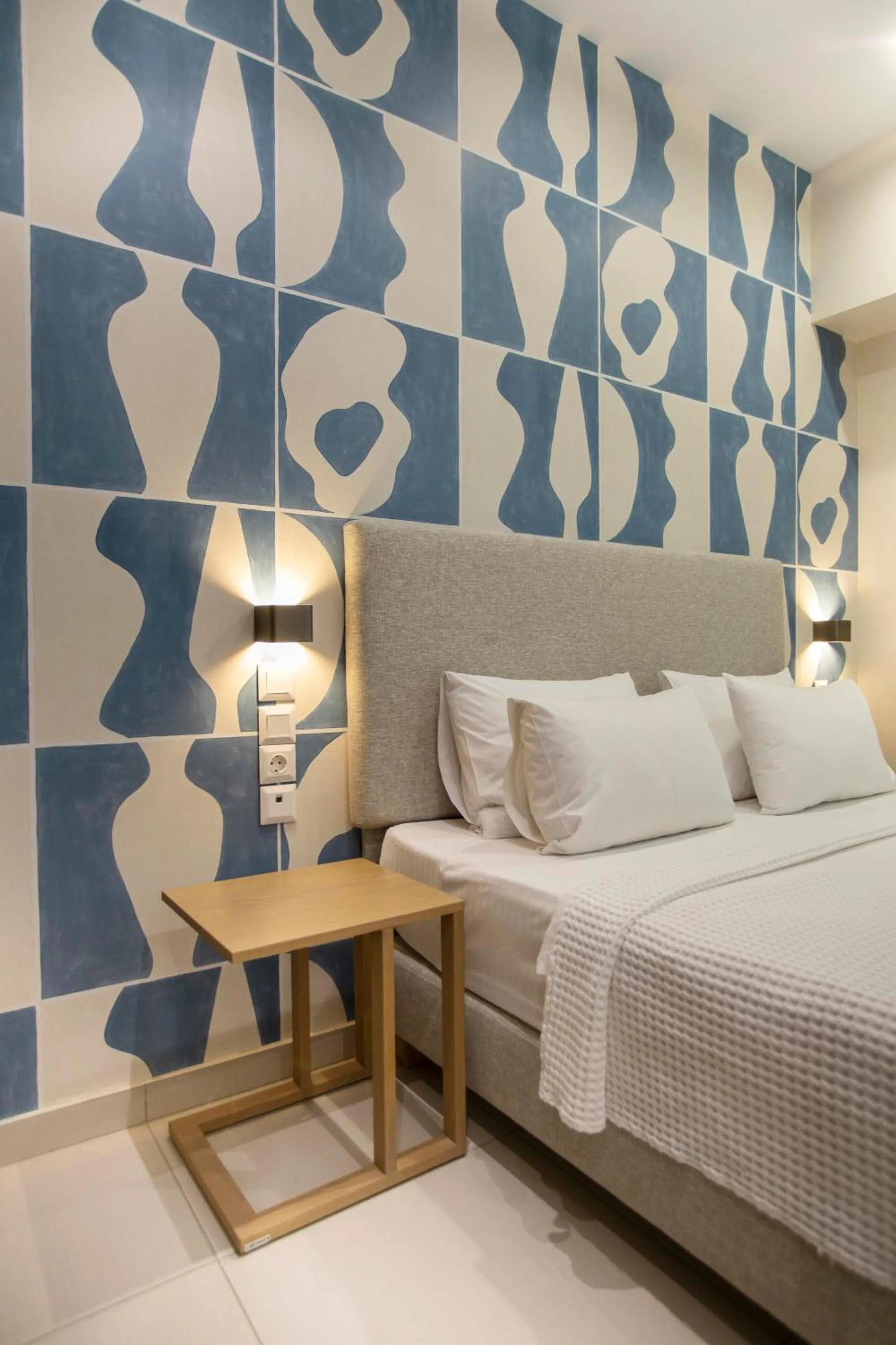 Bed in Phidias Piraeus Hotel