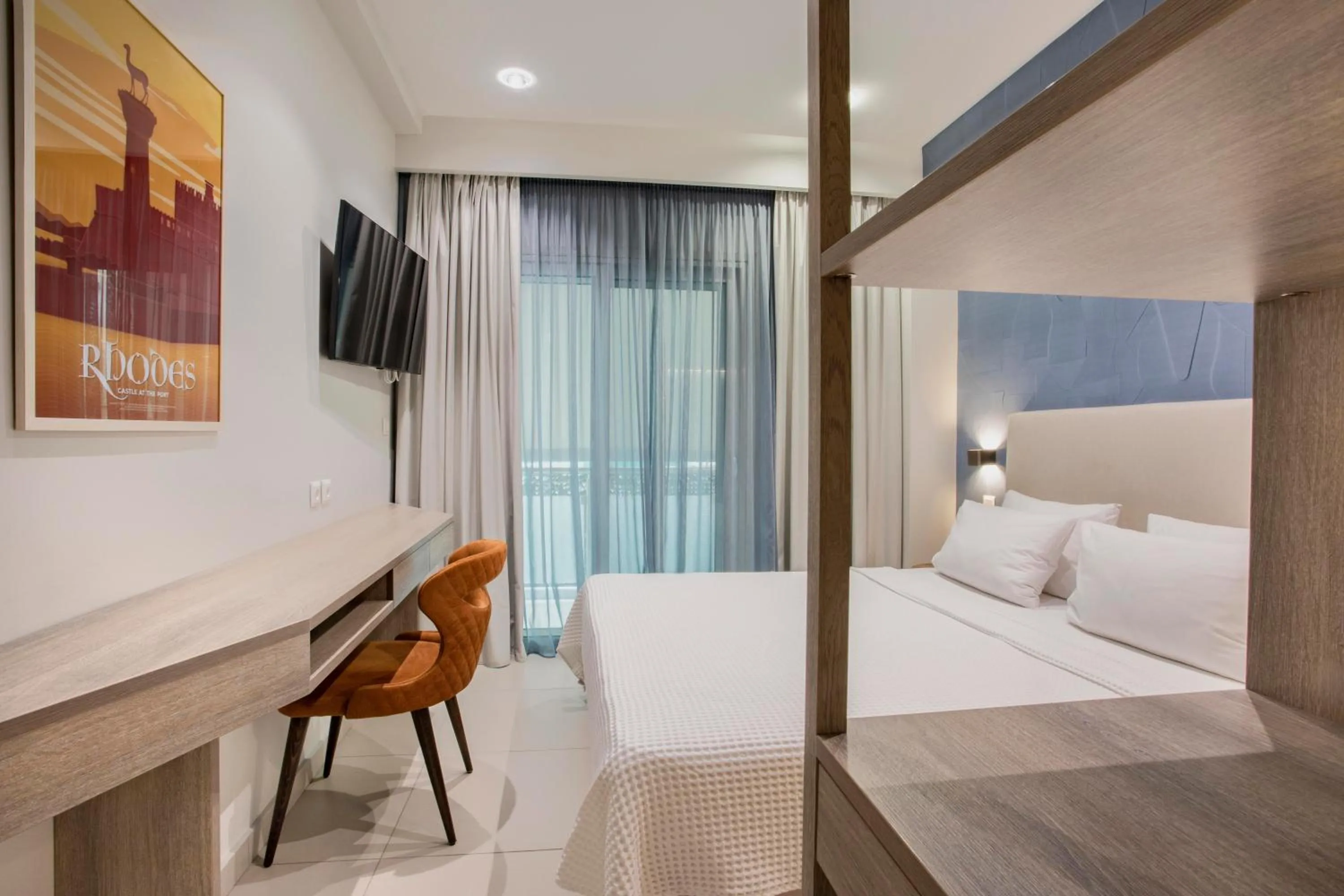 Bed in Phidias Piraeus Hotel