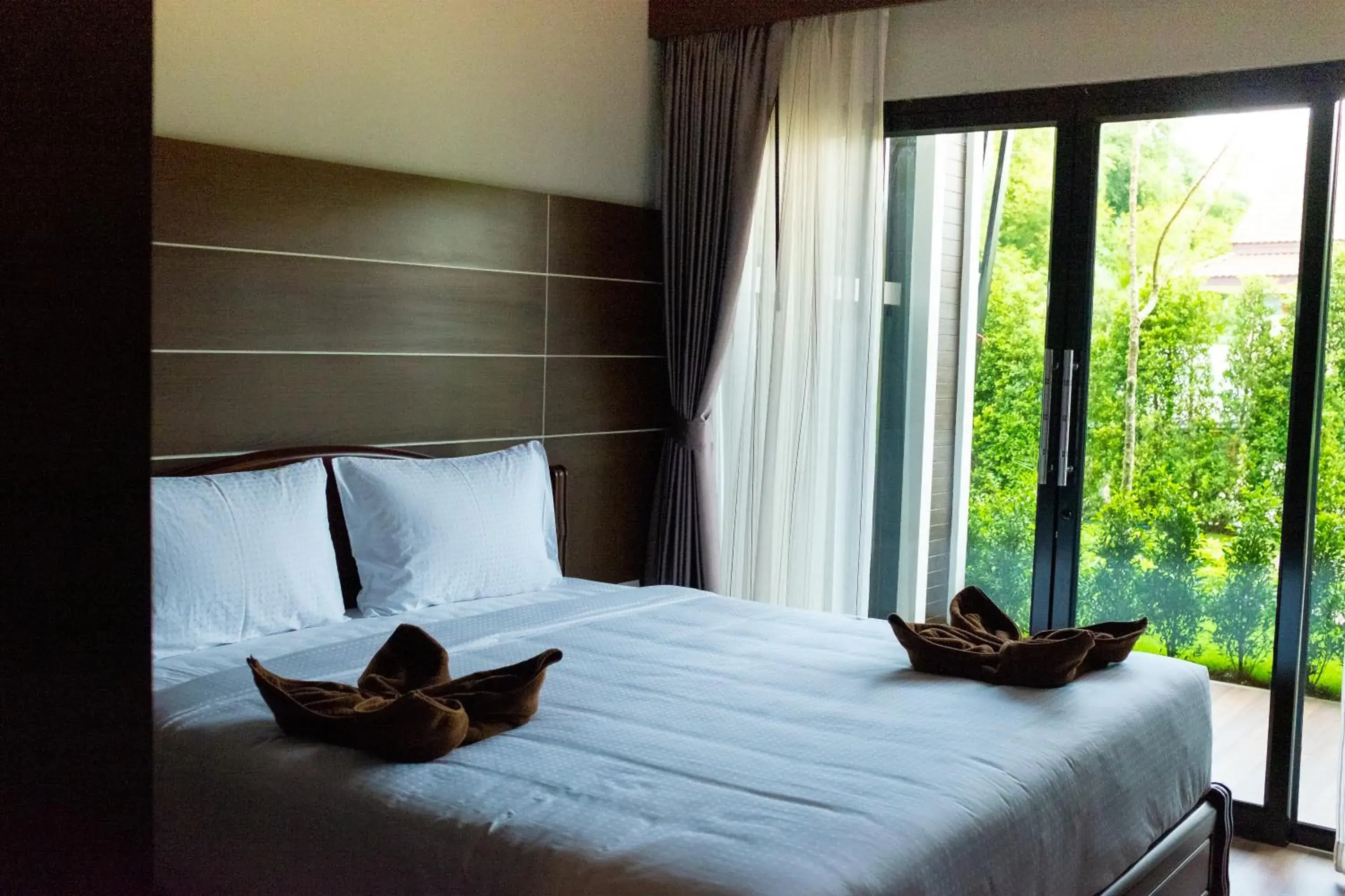 Bed in Oscar Villa Aonang Krabi Bed in Oscar Villa Aonang Krabi