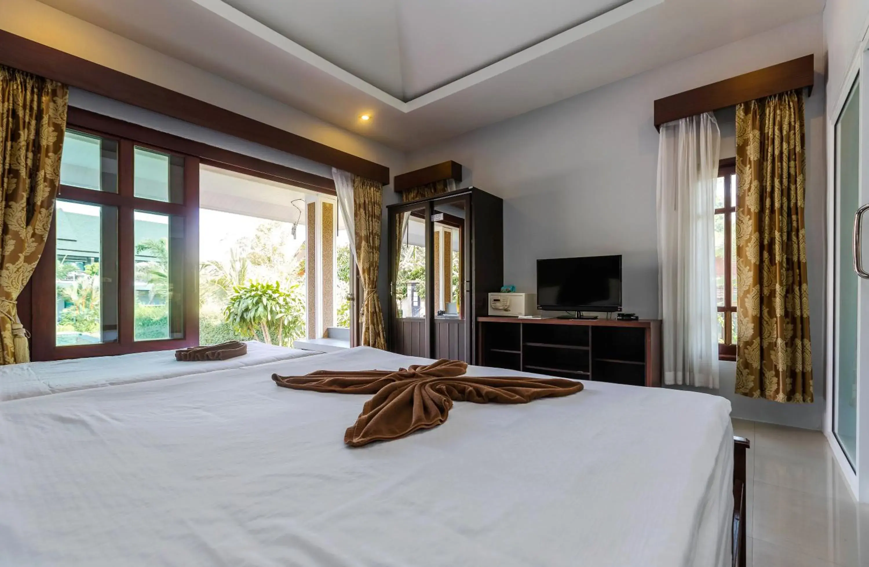 Bed in Oscar Villa Aonang Krabi Bed in Oscar Villa Aonang Krabi