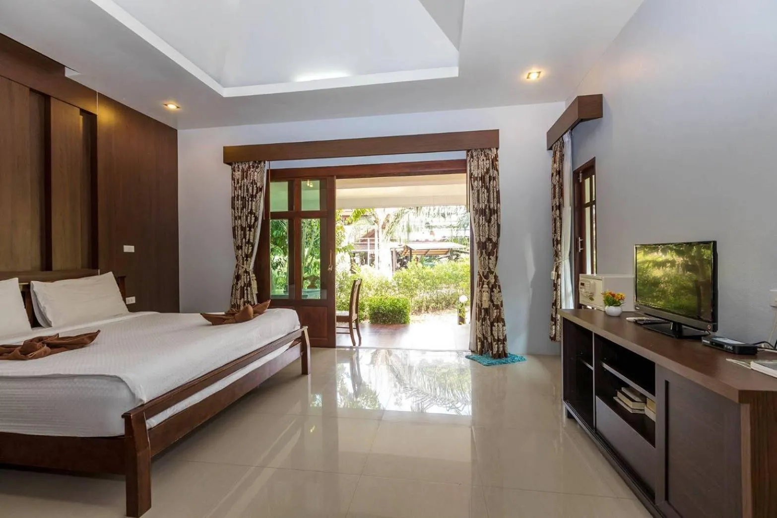 Bed in Oscar Villa Aonang Krabi