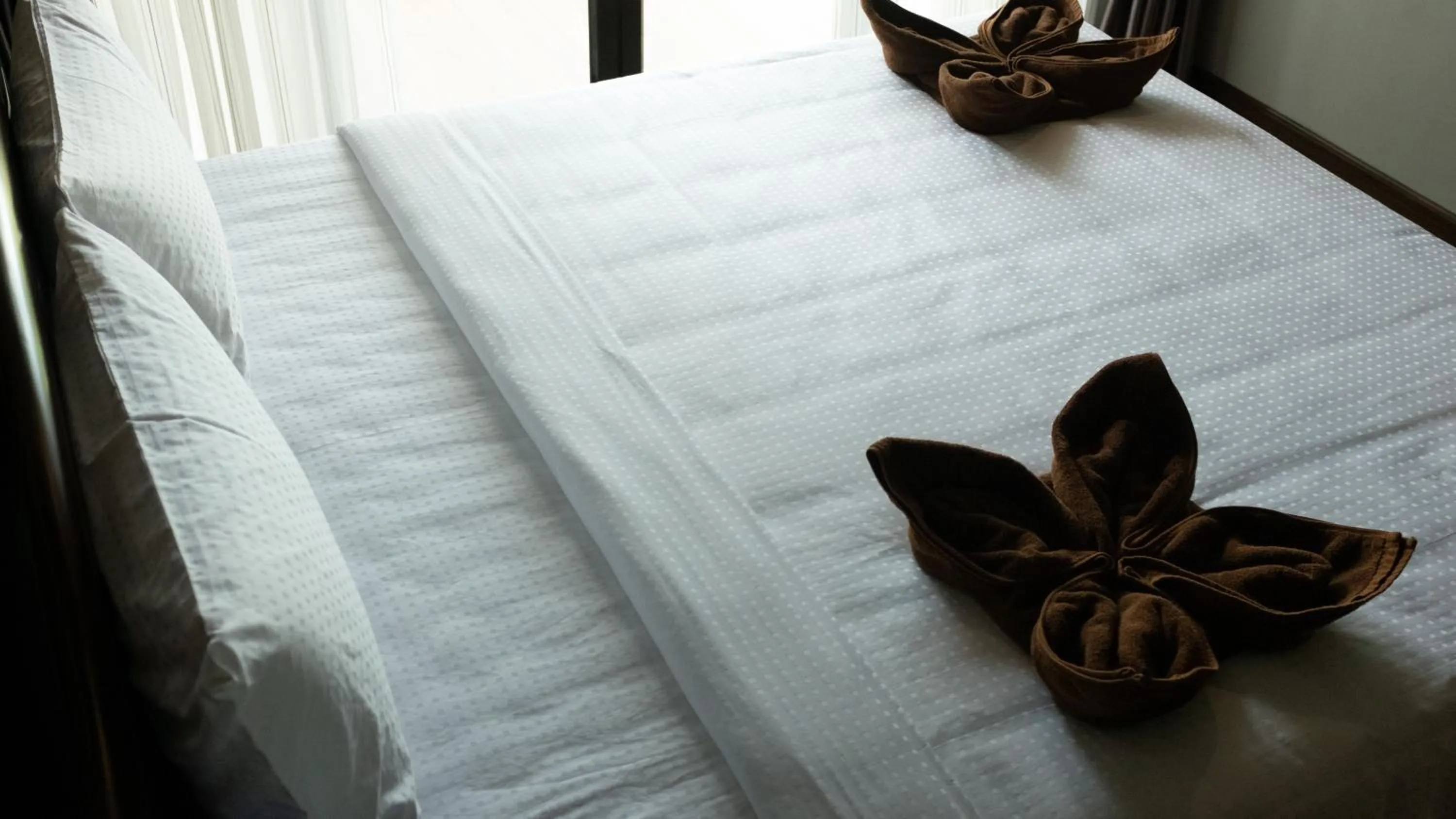 Bed in Oscar Villa Aonang Krabi