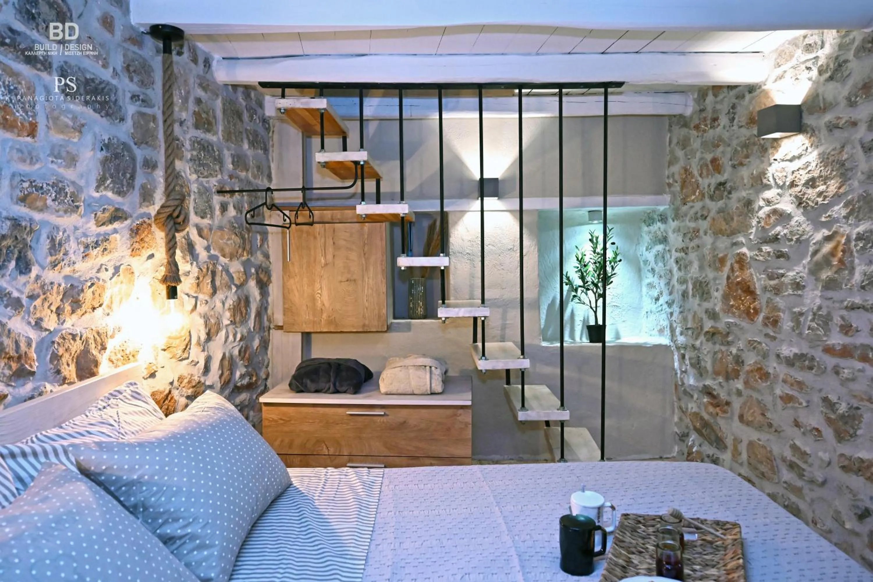 Bed in Pyrgos Houses and Restaurant