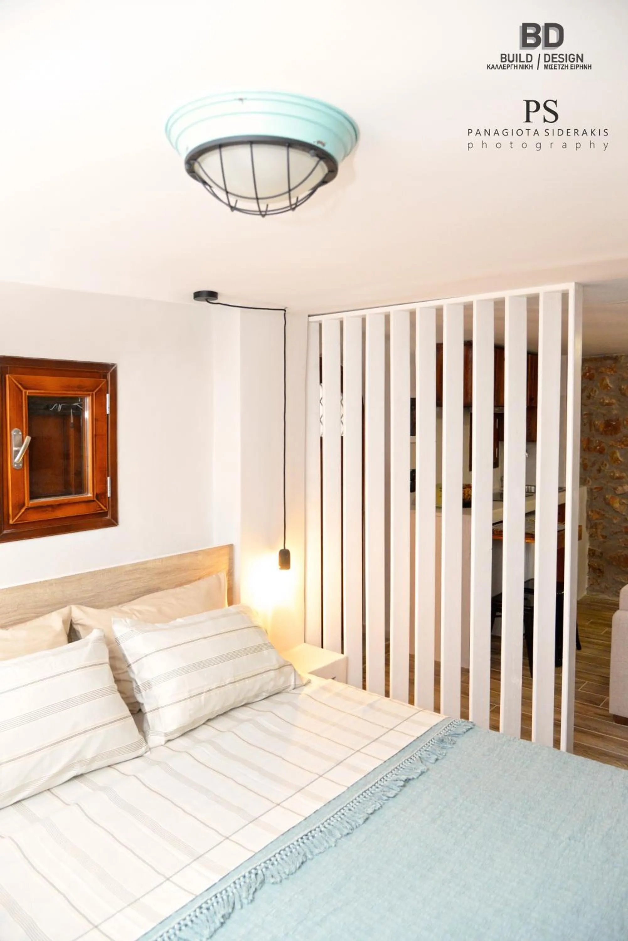 Bed in Pyrgos Houses and Restaurant