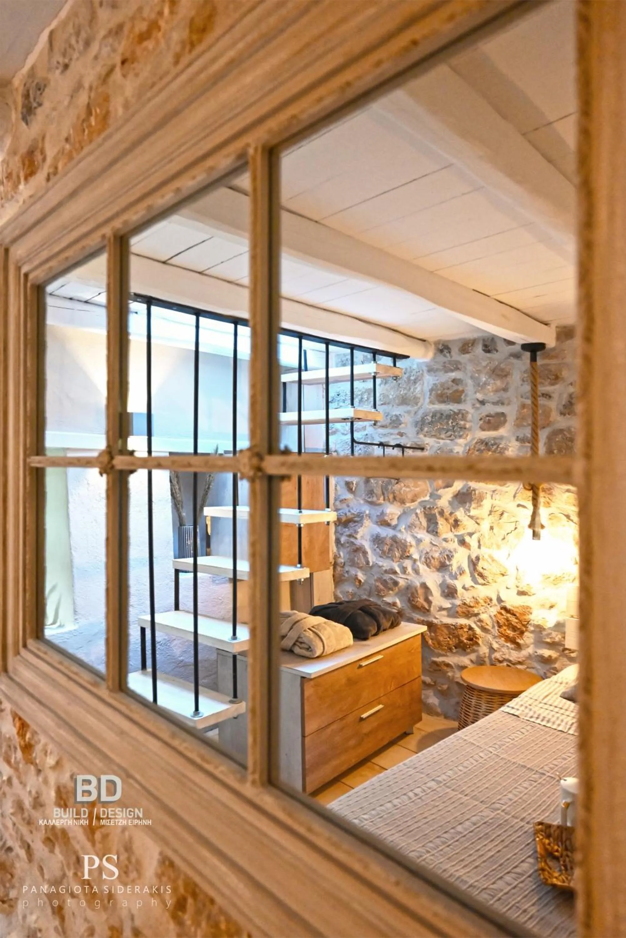 Bed in Pyrgos Houses and Restaurant